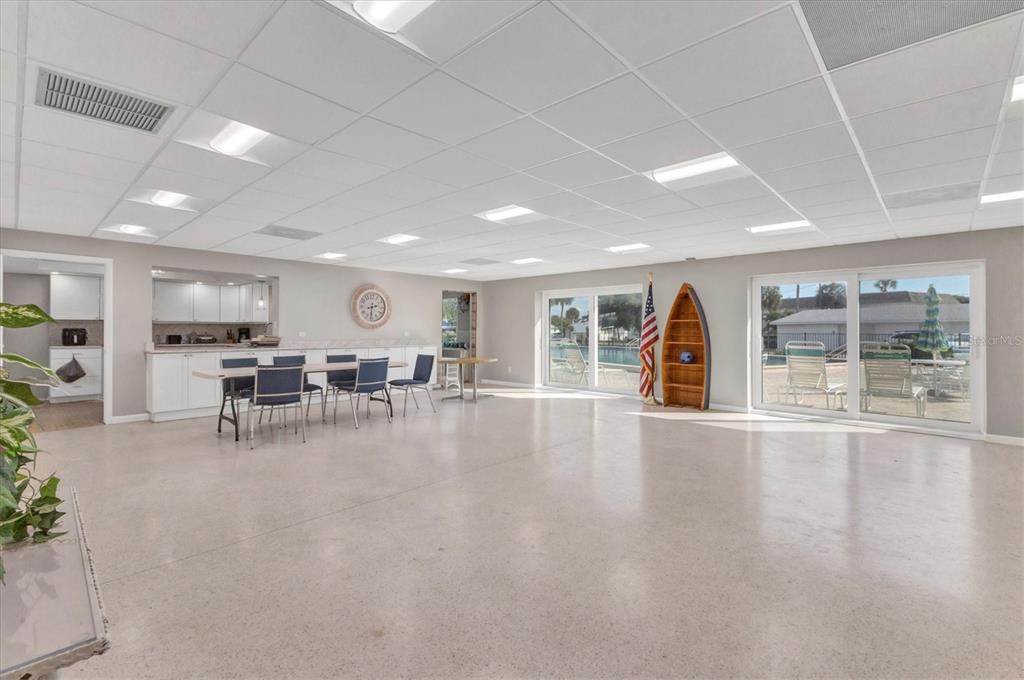 1977 Beach Road, Unit 19 Englewood, FL 34223 - Photo 26 of 47 a view of a kitchen with furniture and wooden floor