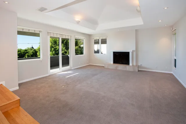 a kitchen with stainless steel appliances granite countertop a stove and a sink