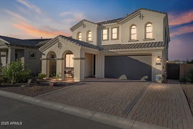 a front view of a house with yard
