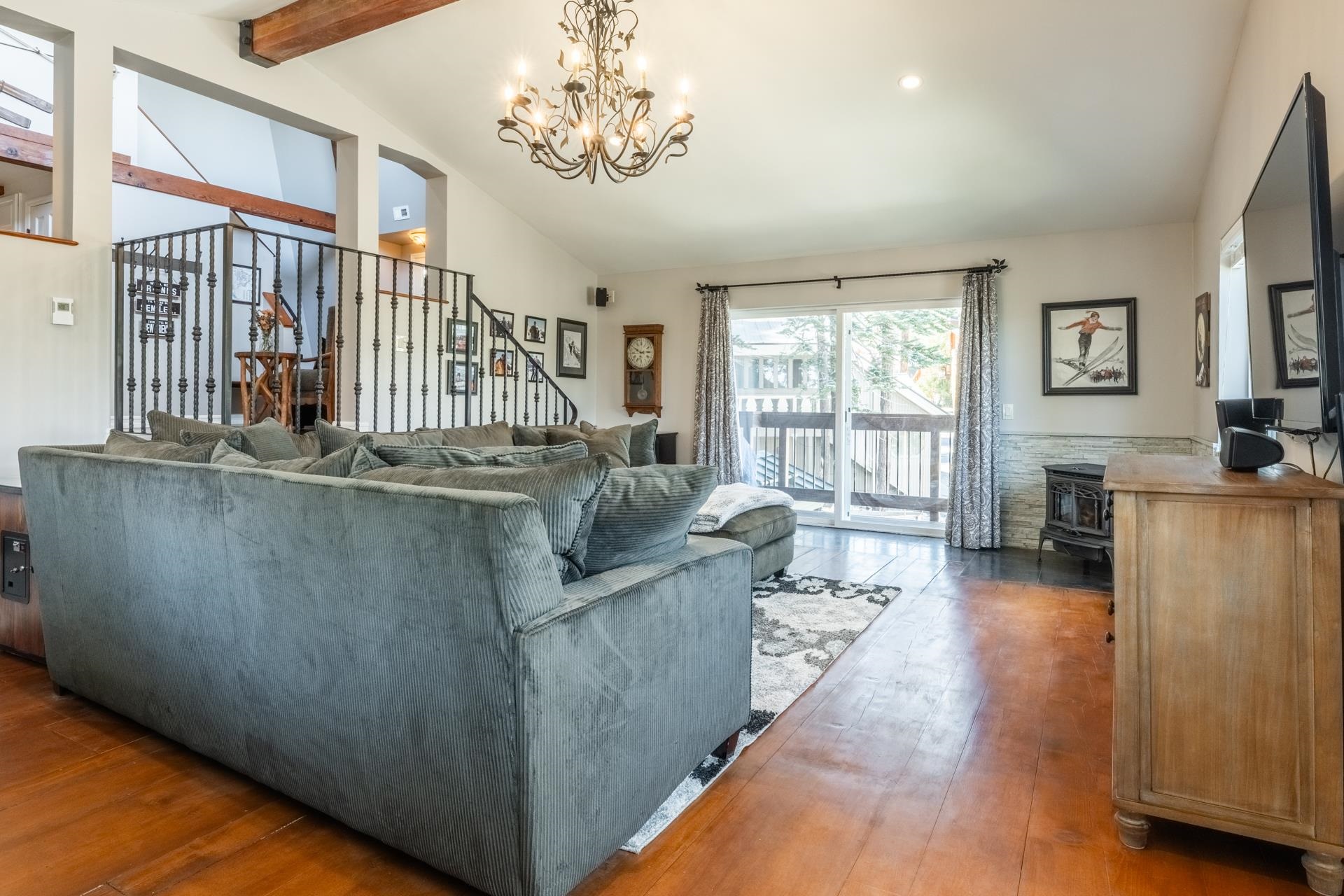 349 Davison Road Mammoth Lakes, CA 93546 - Photo 13 of 43 a living room with furniture and a chandelier