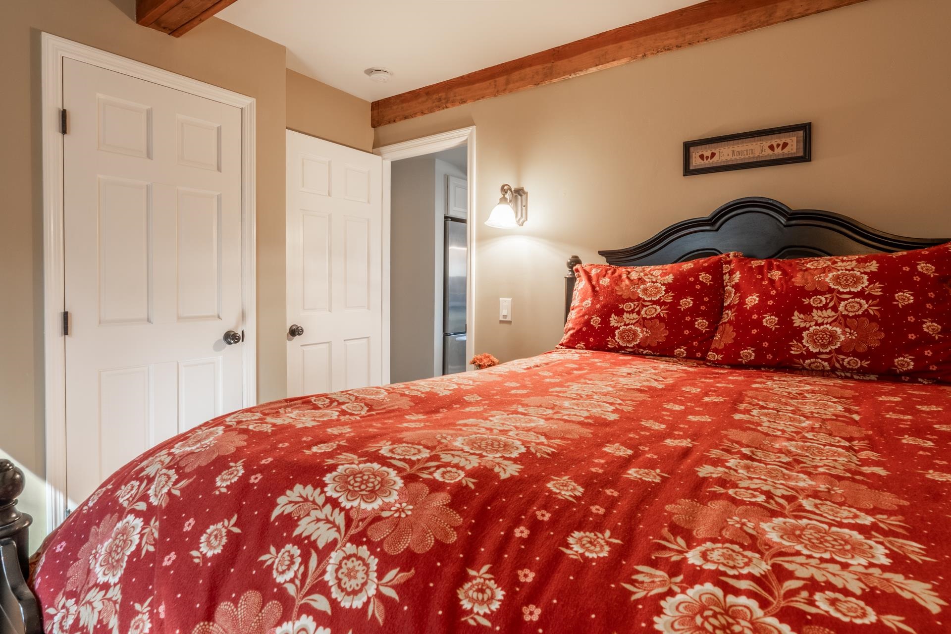 349 Davison Road Mammoth Lakes, CA 93546 - Photo 24 of 43 a bedroom with a bed and a painting on the wall