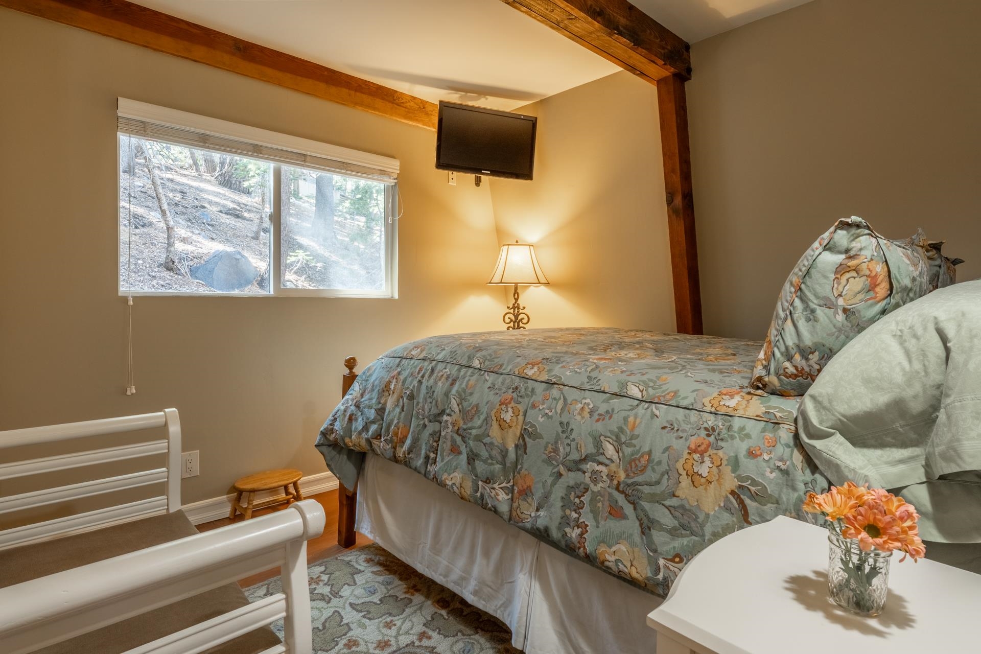 349 Davison Road Mammoth Lakes, CA 93546 - Photo 25 of 43 a bedroom with a bed and wooden floor