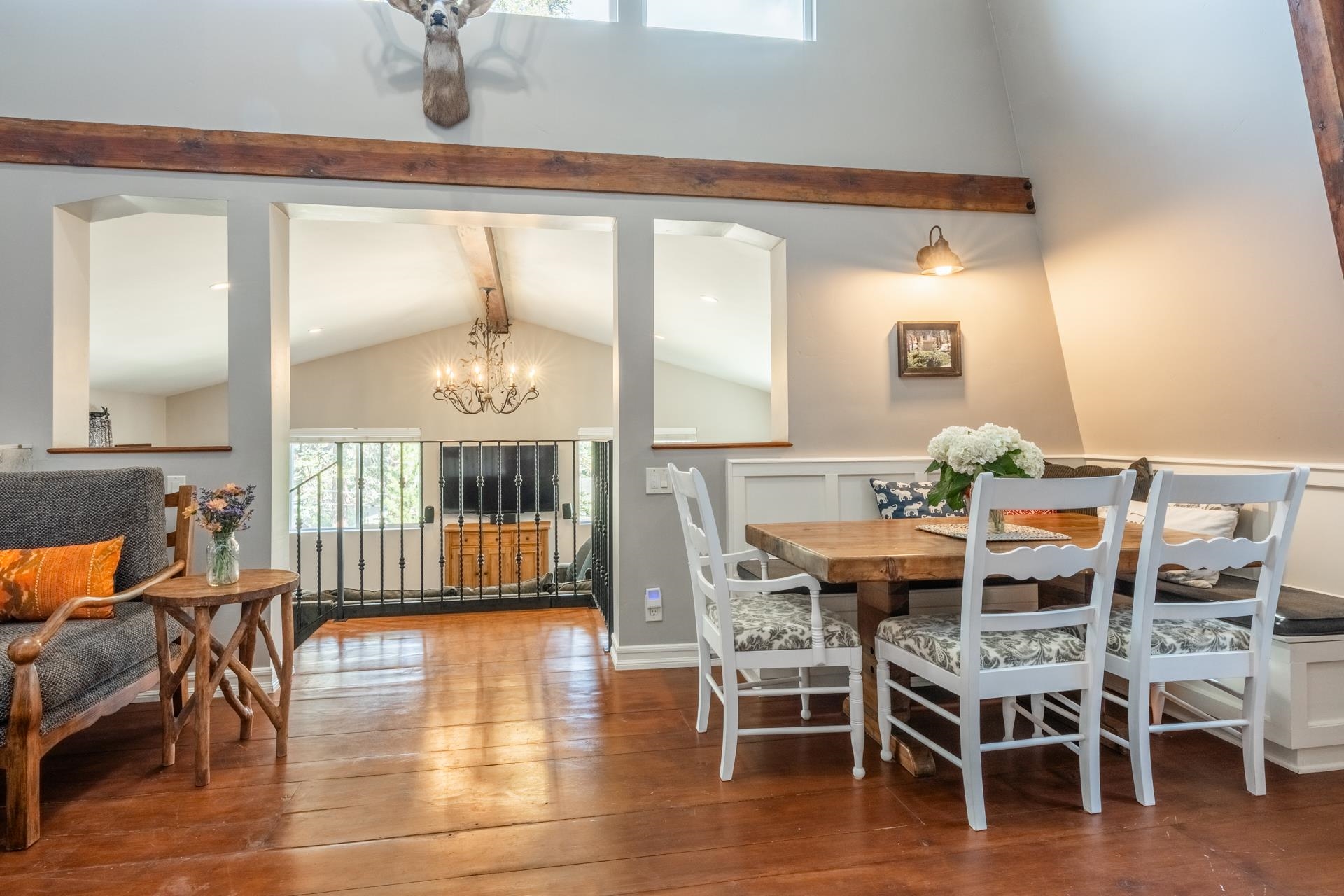349 Davison Road Mammoth Lakes, CA 93546 - Photo 5 of 43 Dining area with beam ceiling, hardwood / wood-style floors, a chandelier, high vaulted ceiling, and recessed lighting