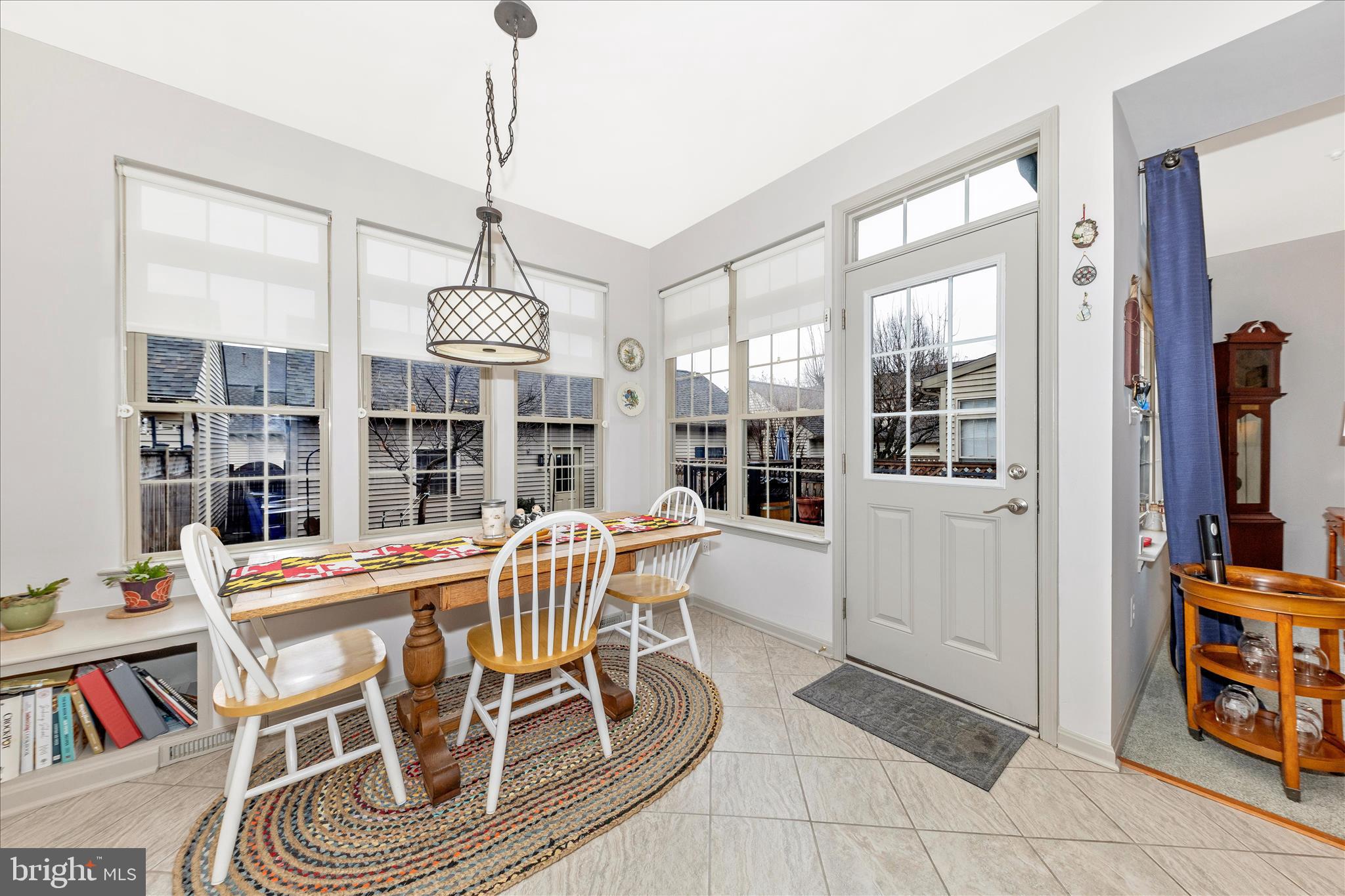 2205 Garden Lane Frederick, MD 21701 - Photo 16 of 48 a view of a dining room with furniture window and outside view