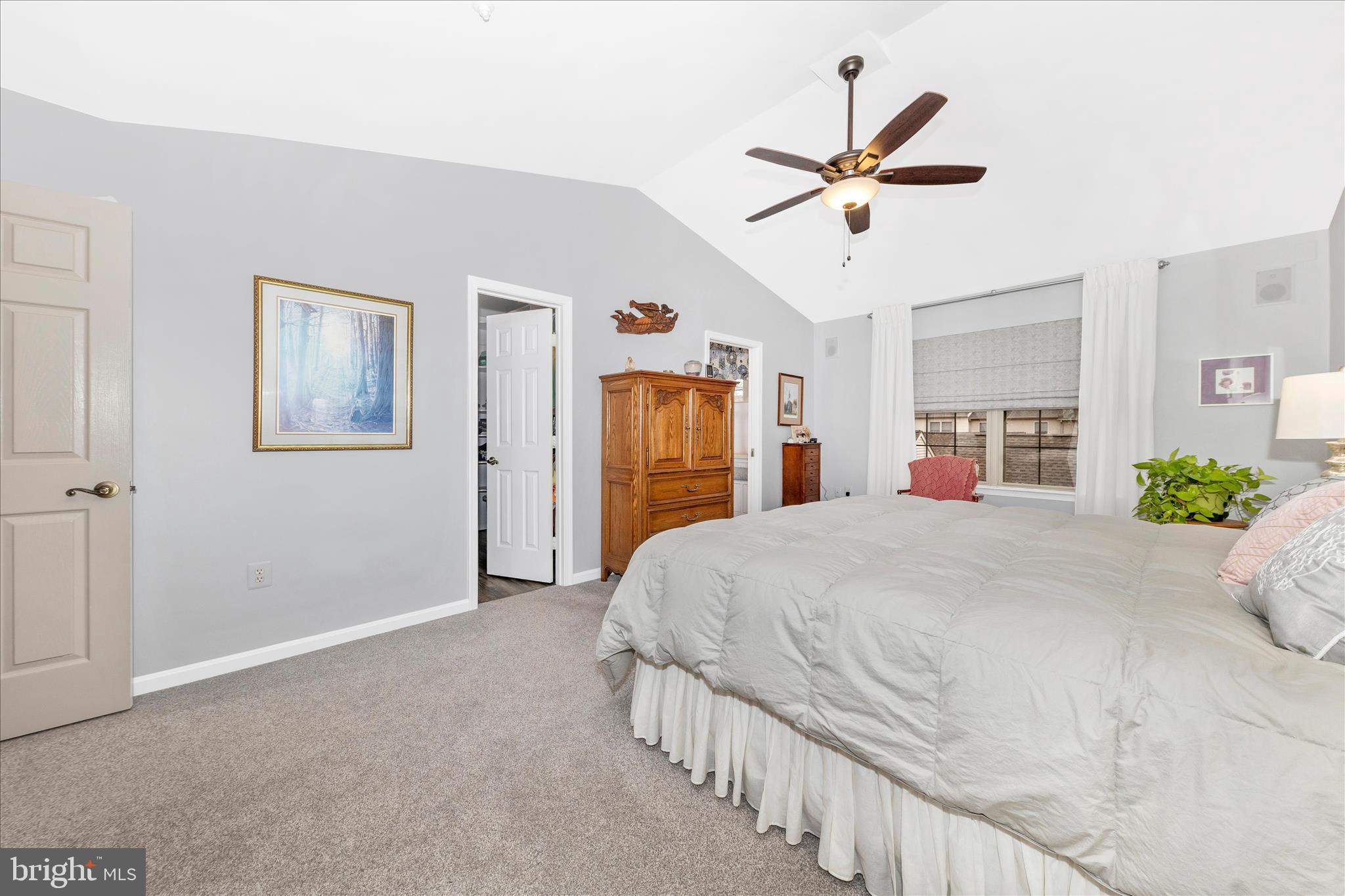 2205 Garden Lane Frederick, MD 21701 - Photo 19 of 48 a bedroom with a large bed and ceiling fan