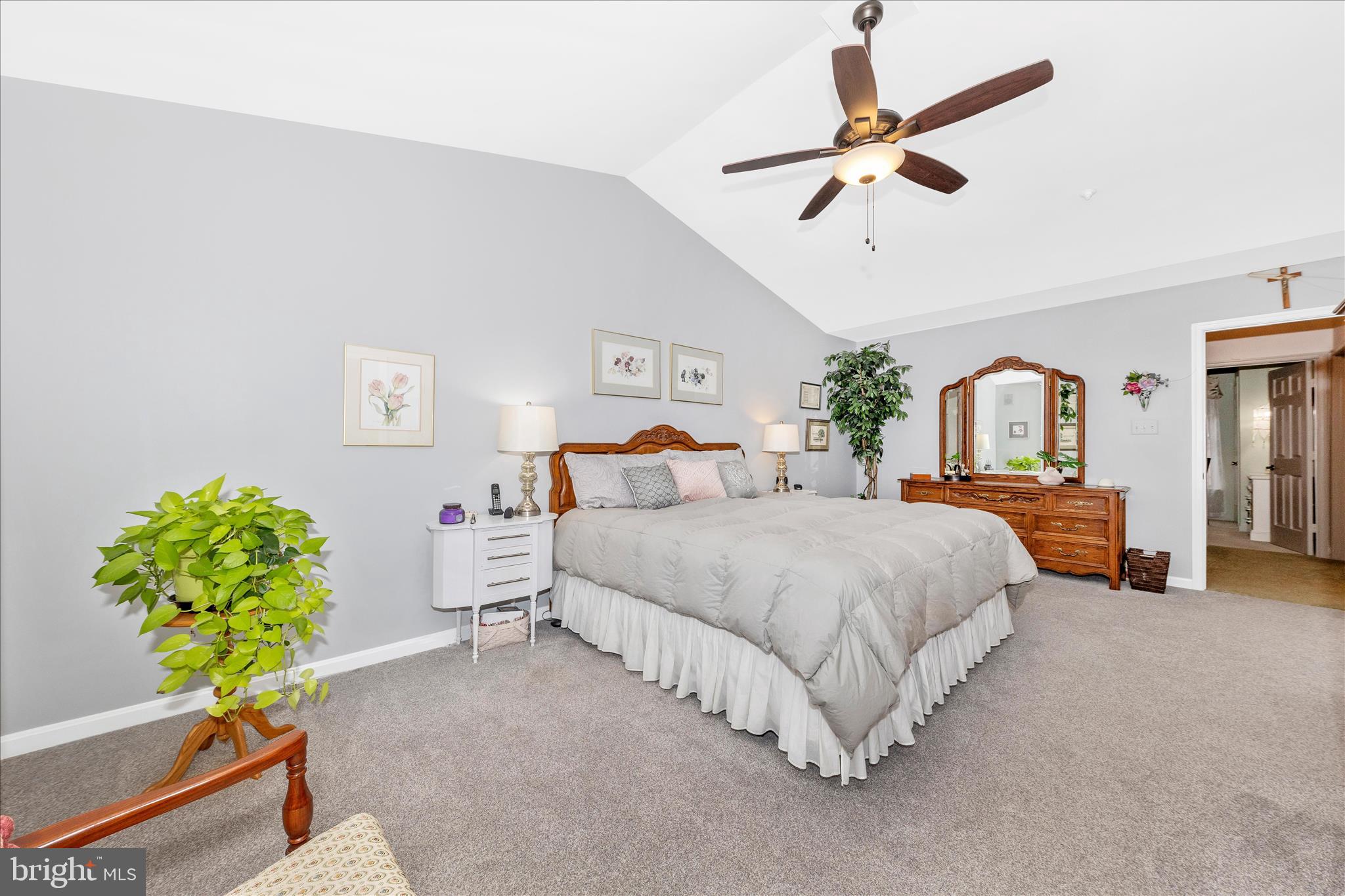 2205 Garden Lane Frederick, MD 21701 - Photo 20 of 48 a bedroom with a bed chandelier and a window