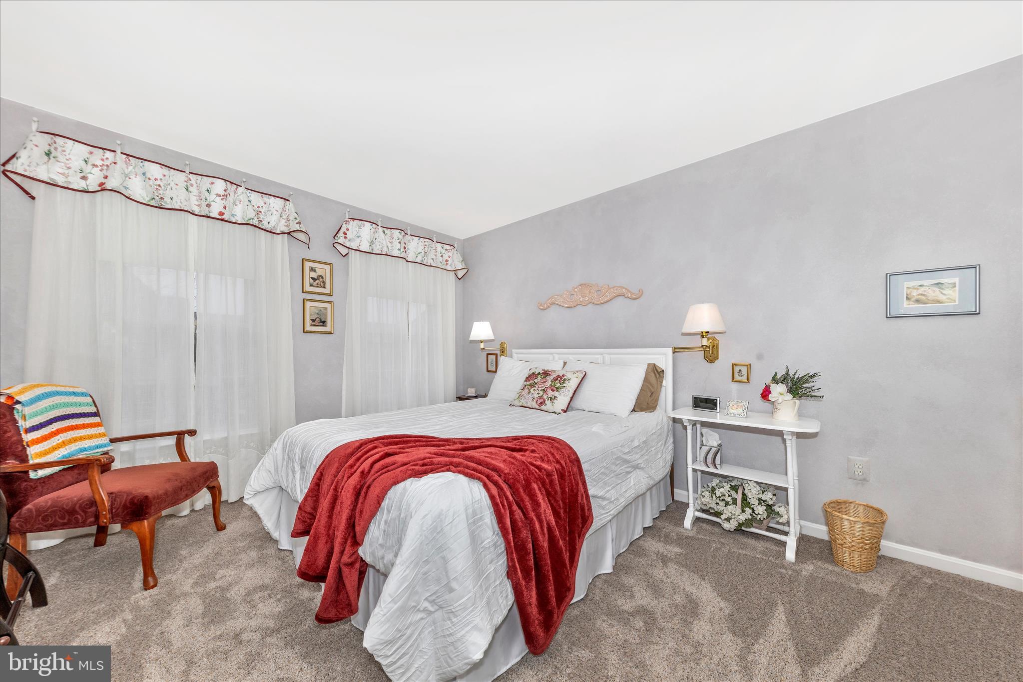 2205 Garden Lane Frederick, MD 21701 - Photo 24 of 48 a bedroom with a bed and a couch
