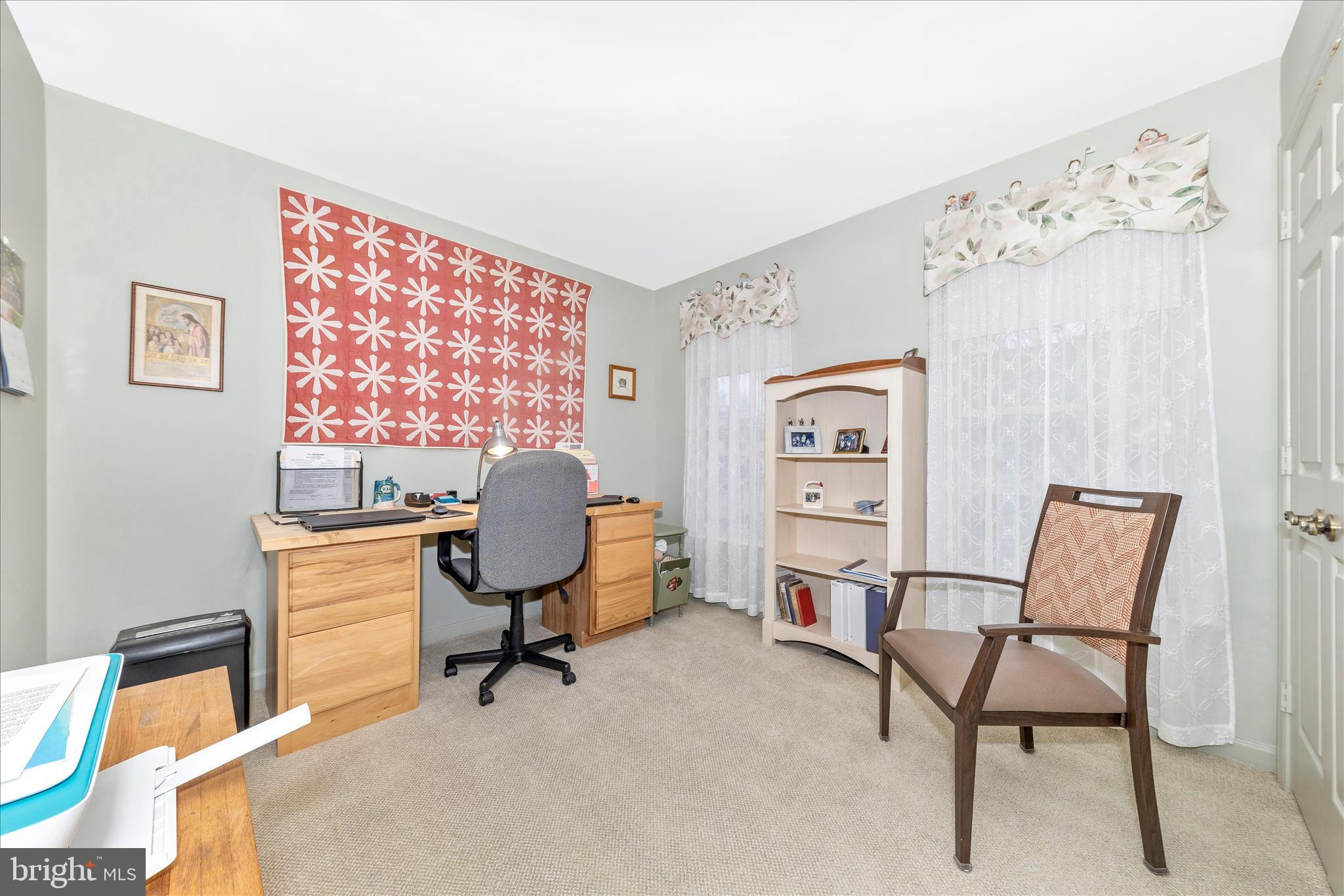 2205 Garden Lane Frederick, MD 21701 - Photo 26 of 48 a view of a workspace with furniture and a window
