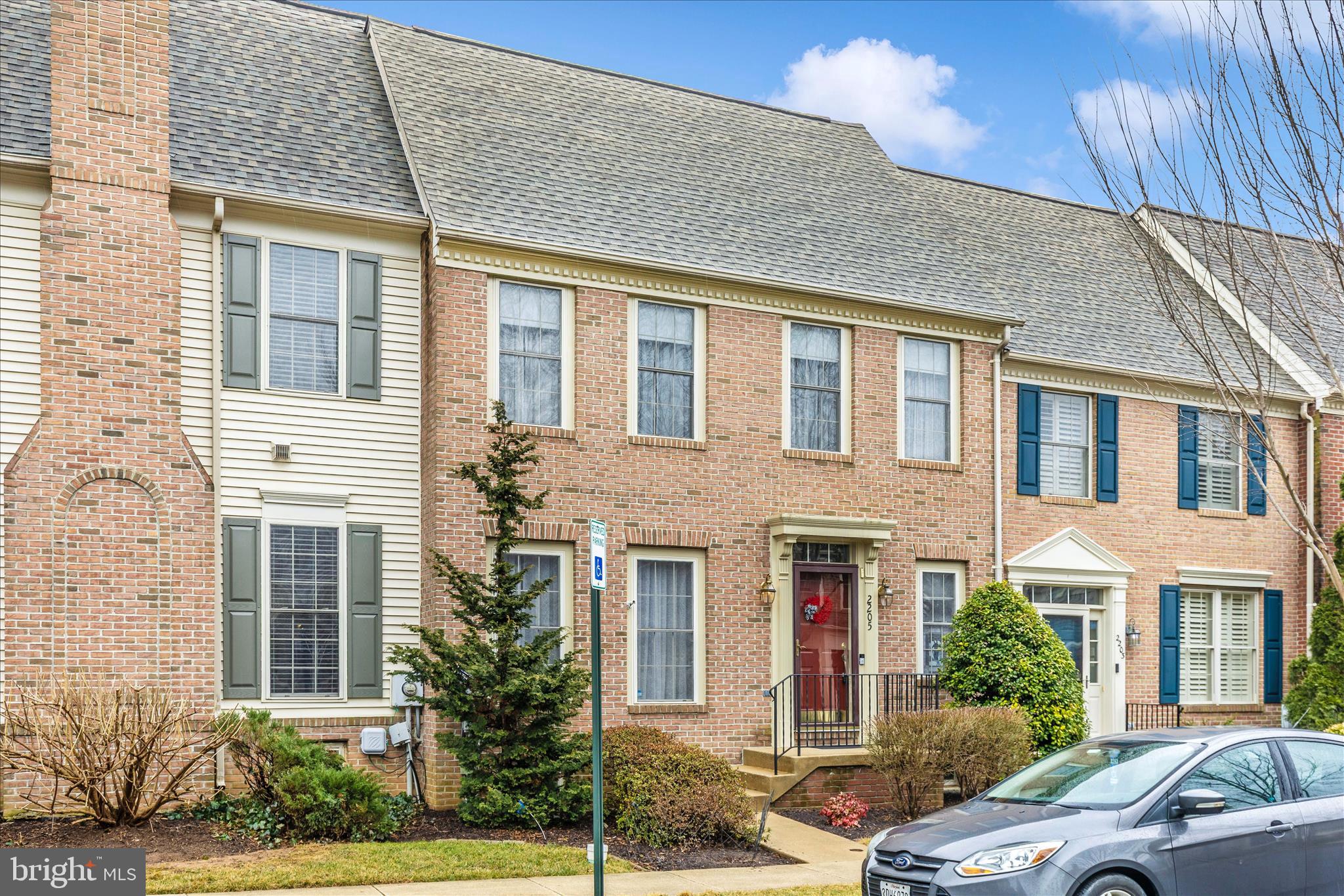2205 Garden Lane Frederick, MD 21701 - Photo 40 of 48 a front view of a house with a yard