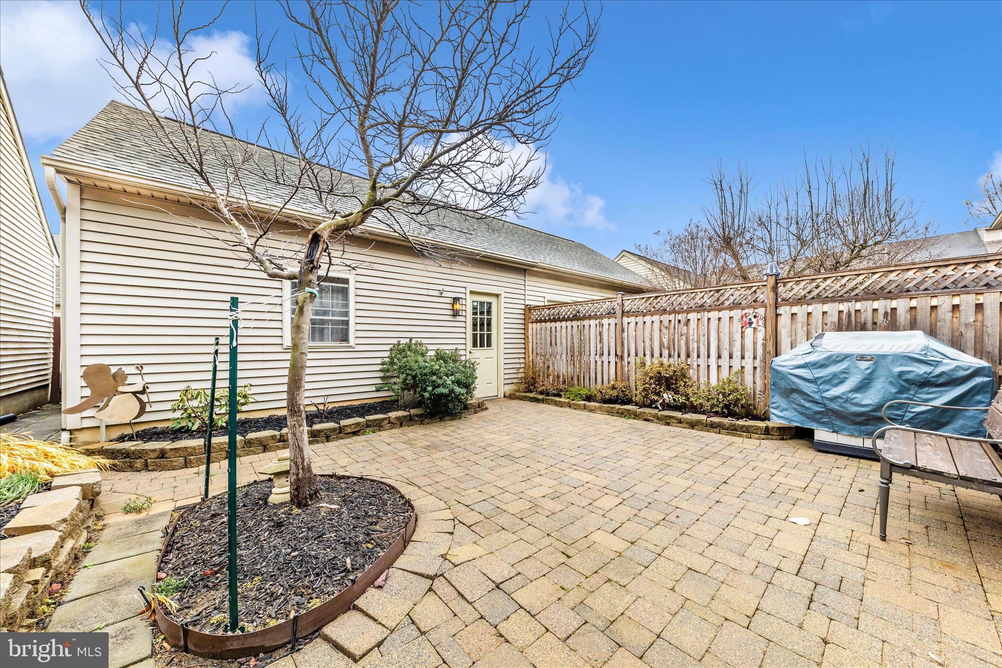 2205 Garden Lane Frederick, MD 21701 - Photo 42 of 48 a view of a backyard with table and chairs