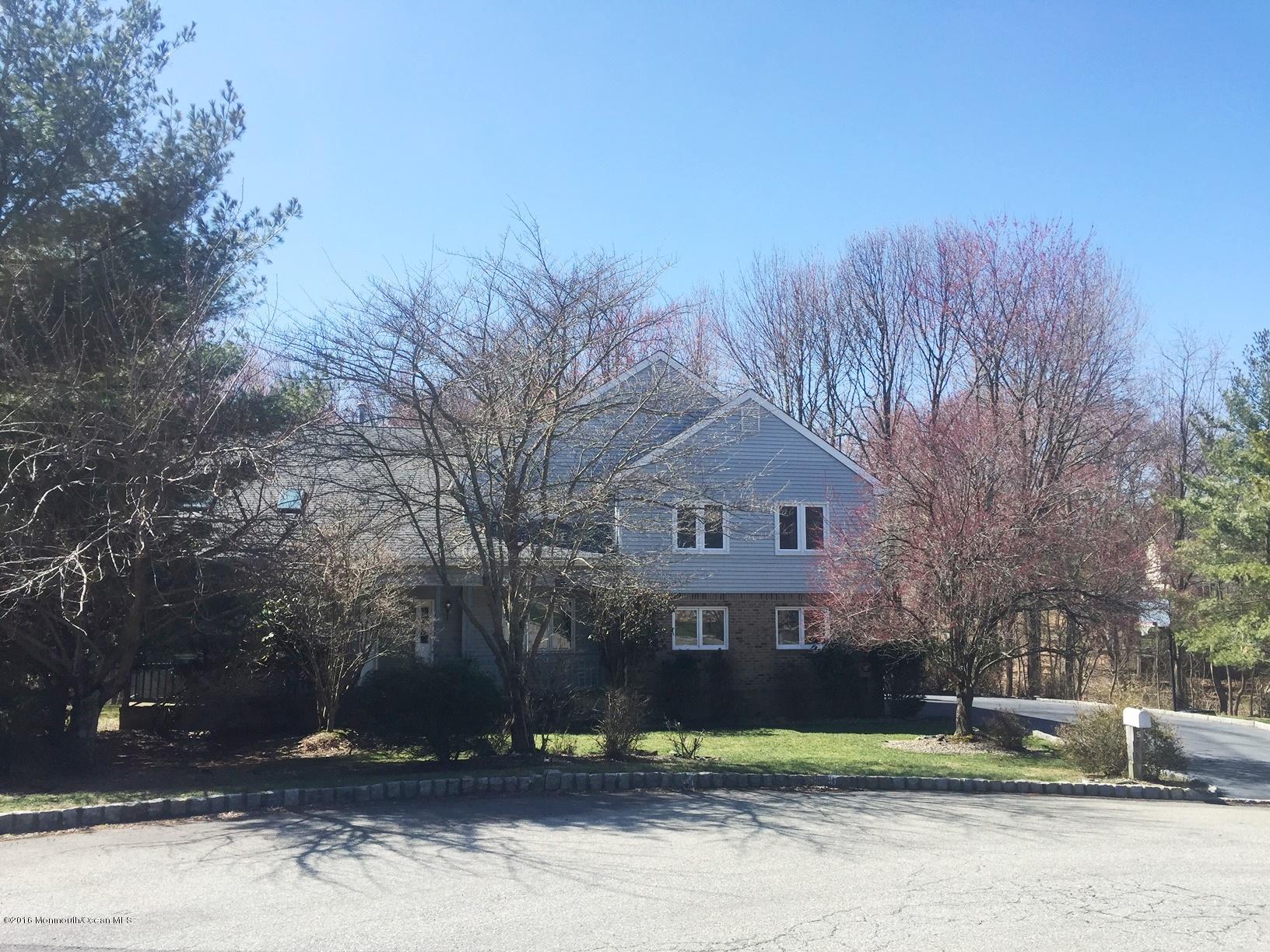 5 Knob Hill Road Morganville, NJ 07751 - Photo 1 of 6 a view of a house with a yard