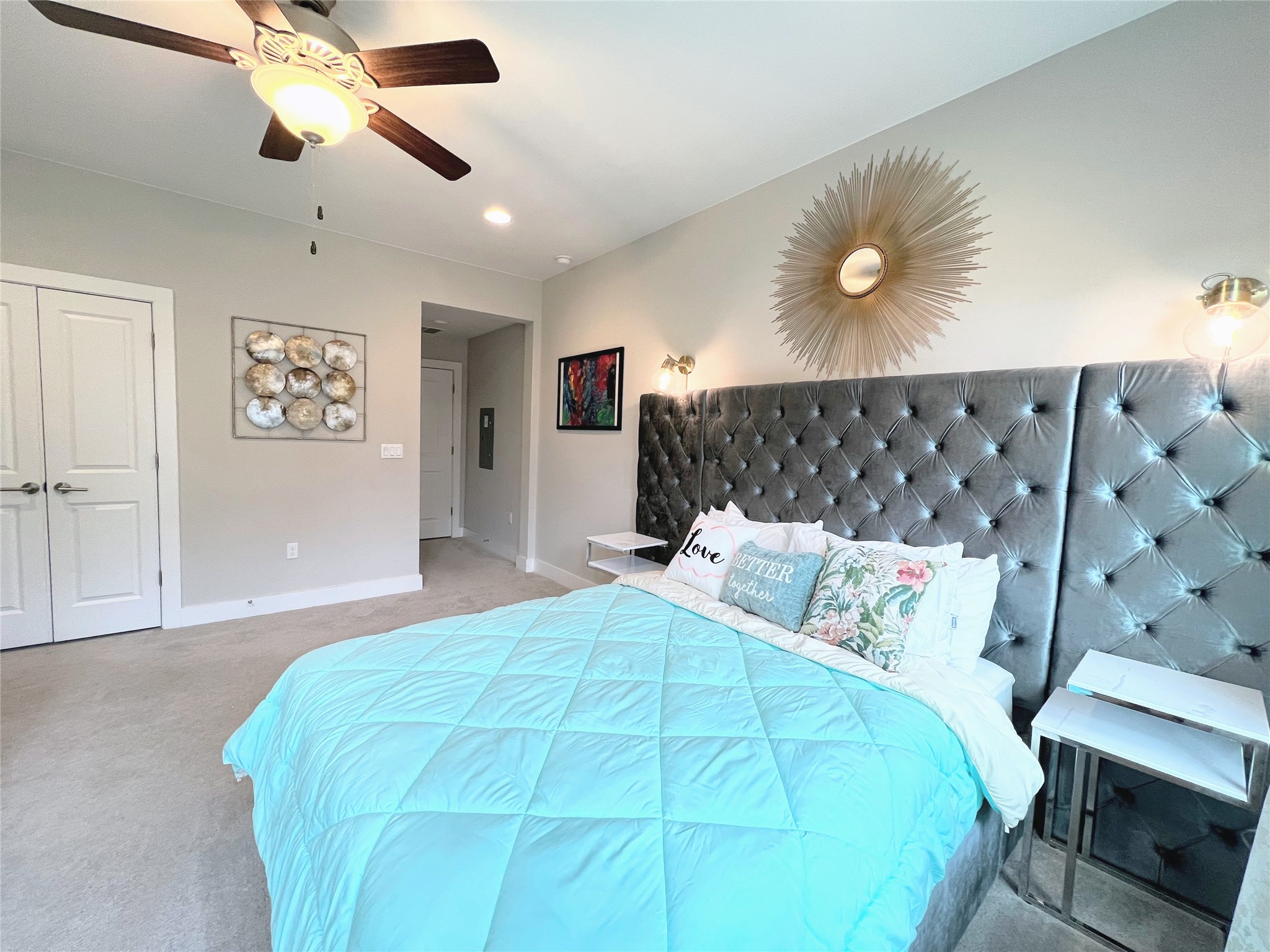 807 East 16th Street, Unit B Austin, TX 78702 - Photo 14 of 25 a bedroom with a bed and a chandelier