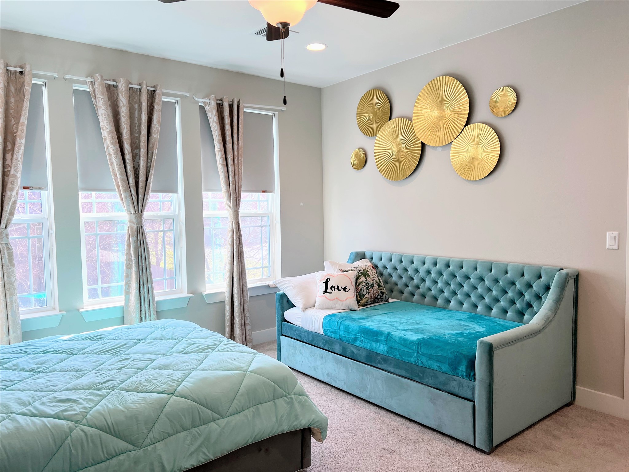 807 East 16th Street, Unit B Austin, TX 78702 - Photo 16 of 25 a bedroom with a bed and chandelier
