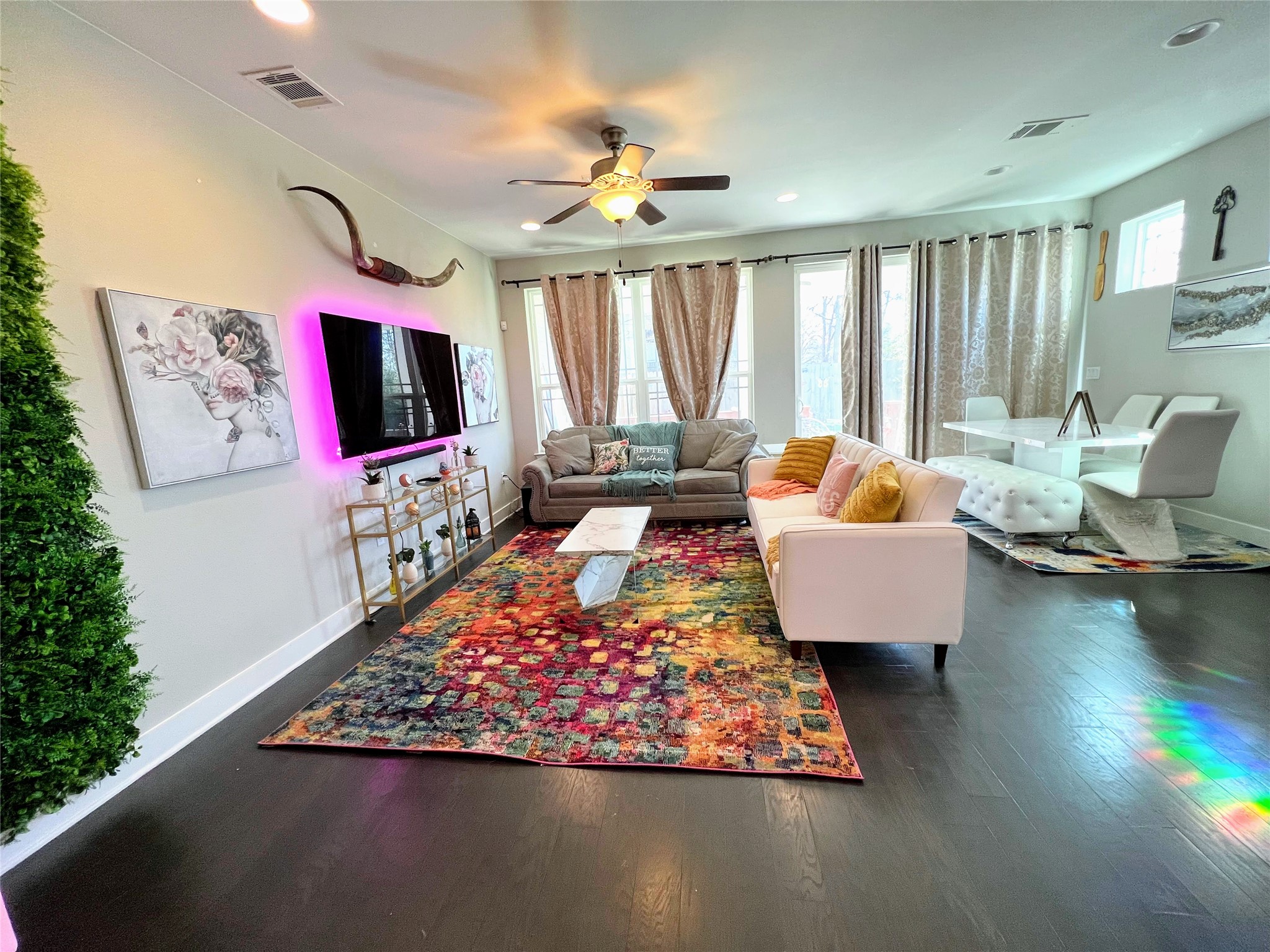 807 East 16th Street, Unit B Austin, TX 78702 - Photo 2 of 25 a living room with furniture and a flat screen tv