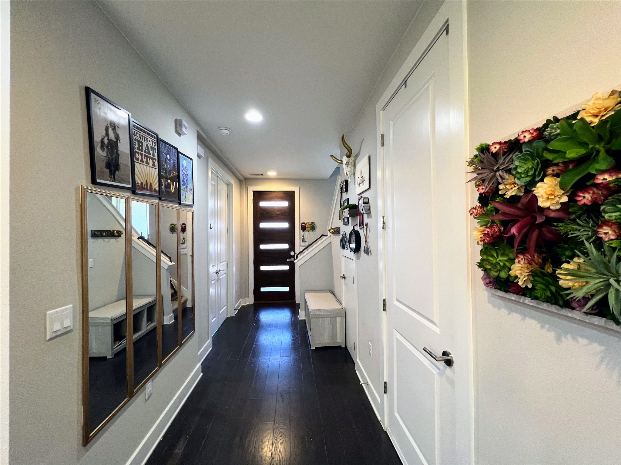 807 East 16th Street, Unit B Austin, TX 78702 - Photo 3 of 25 a view of a hallway with wooden floor and stairs
