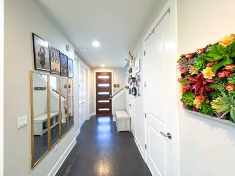 807 East 16th Street, Unit B Austin, TX 78702 - Photo 3 of 31 a view of an entryway with wooden floor and a potted plant