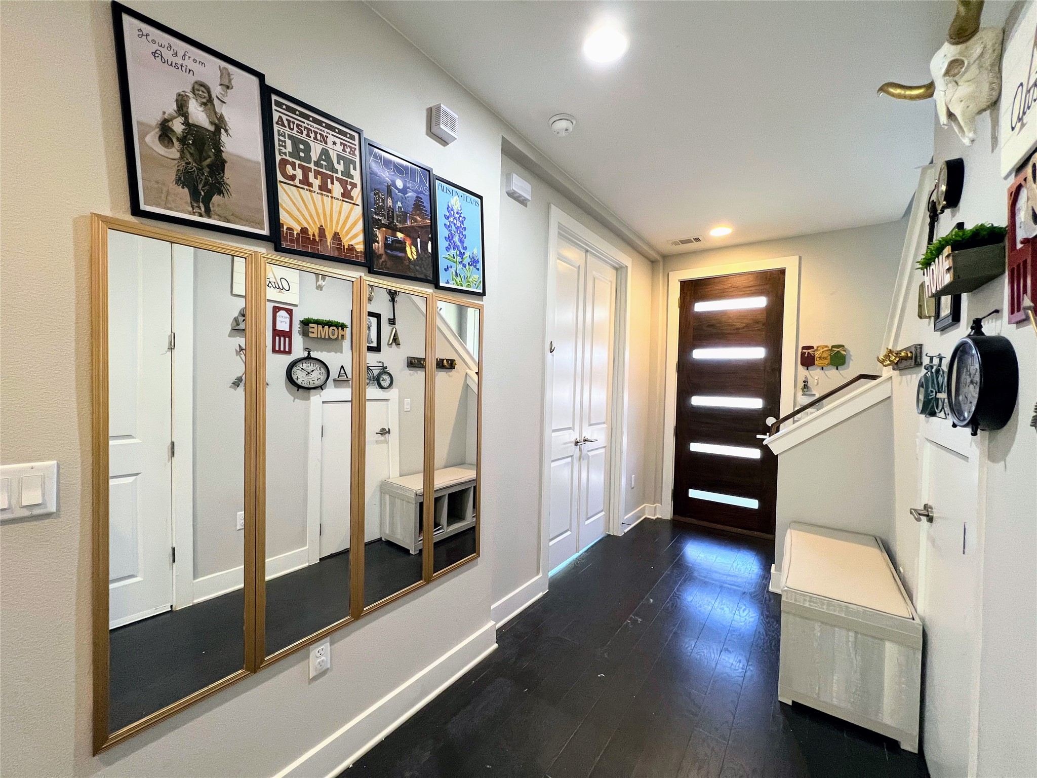 807 East 16th Street, Unit B Austin, TX 78702 - Photo 4 of 25 This bright entryway provides a spacious first impression and a smooth transition into the open living areas.