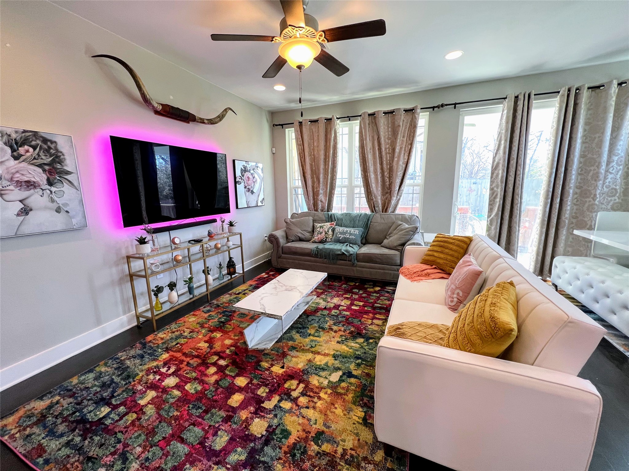 807 East 16th Street, Unit B Austin, TX 78702 - Photo 25 of 25 a living room with furniture and a flat screen tv