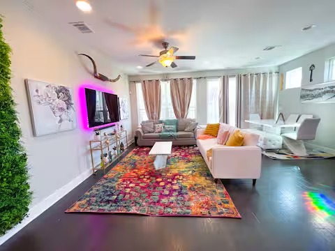 807 East 16th Street, Unit B Austin, TX 78702 - Photo 31 of 31 a living room with furniture and a flat screen tv