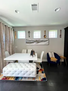 a bedroom with a bed and ceiling fan