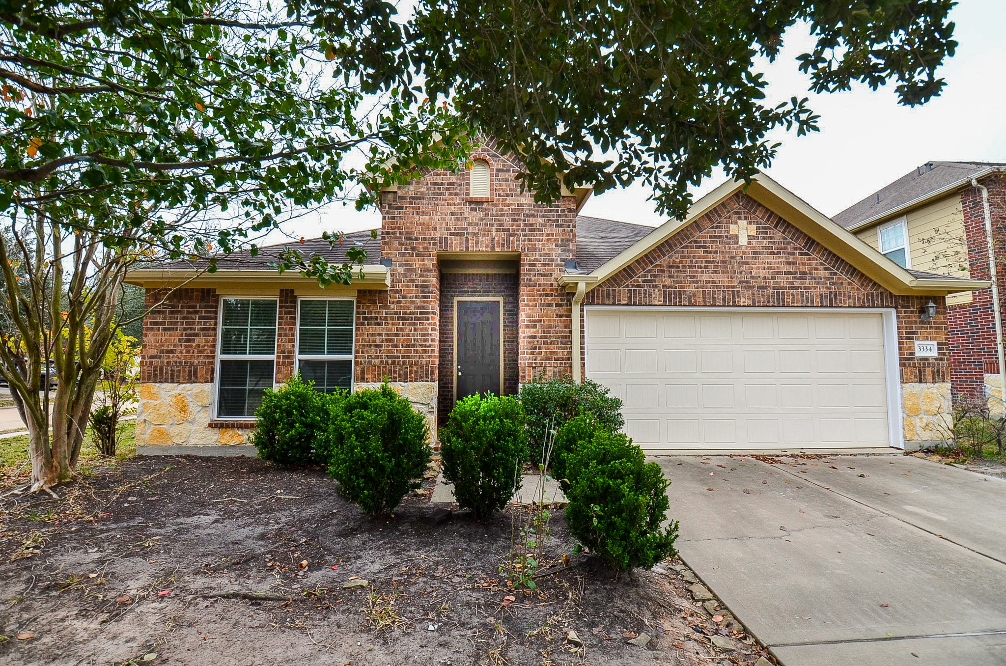 3334 Windsor Ranch Lane Katy, TX 77494 - Photo 1 of 32 Brick and Stone elevation