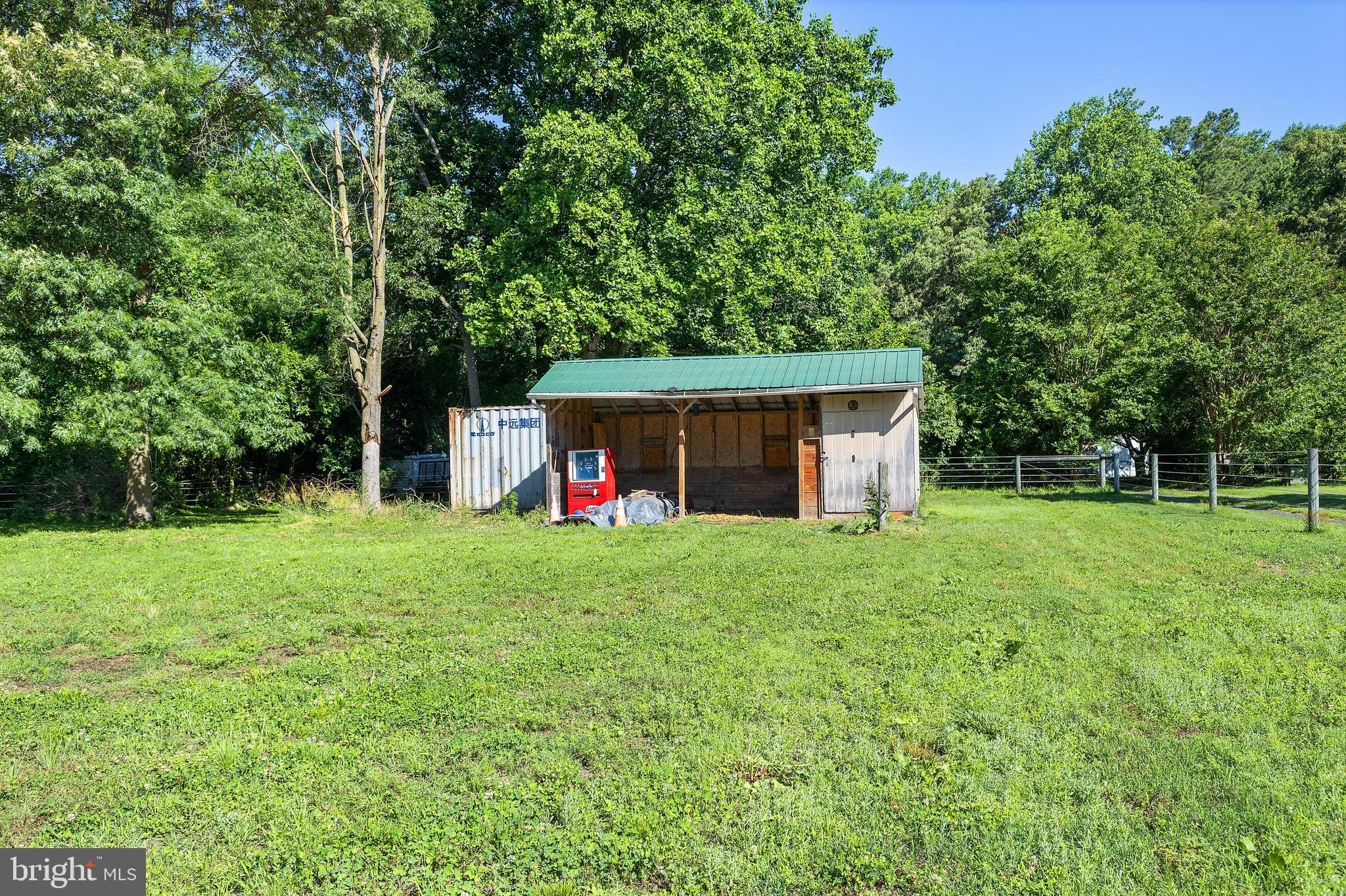 7112 East New Market Ellwood Road Hurlock, MD 21643 - Photo 28 of 41 a view of a house with backyard and garden