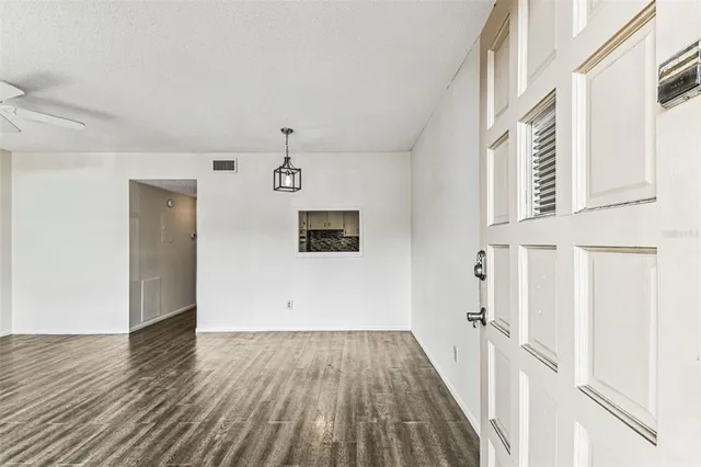 a bathroom with a sink toilet a mirror and shower