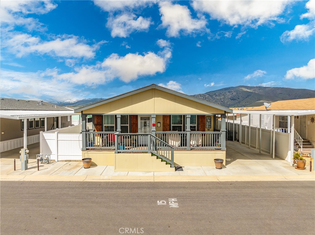 600 South Dennison Road, Unit 50 Tehachapi, CA 93561 - Photo 1 of 1 a view of a house with a swimming pool