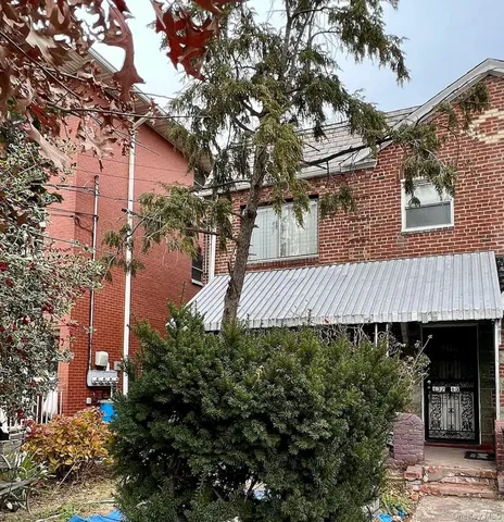 front view of a house with a street