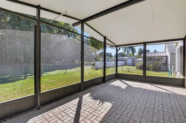 a view of a park with large trees