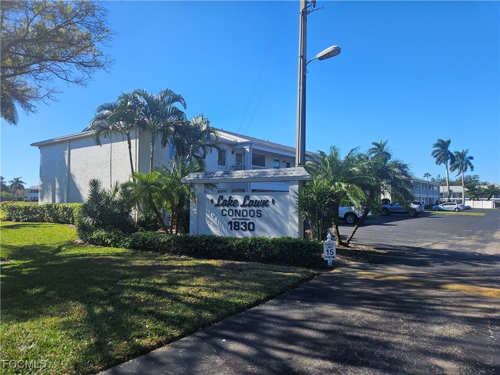 1830 Brantley Road, Unit F204 Fort Myers, FL 33907 - Photo 18 of 23 a view of a street with a building in the background