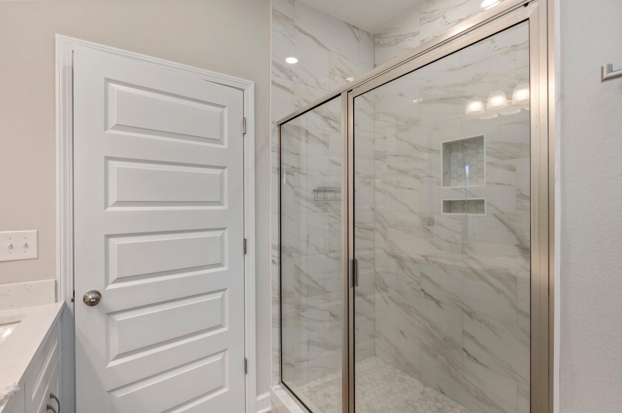 5754 Wayne Rogers Road Crestview, FL 32539 - Photo 16 of 44 a bathroom with a shower