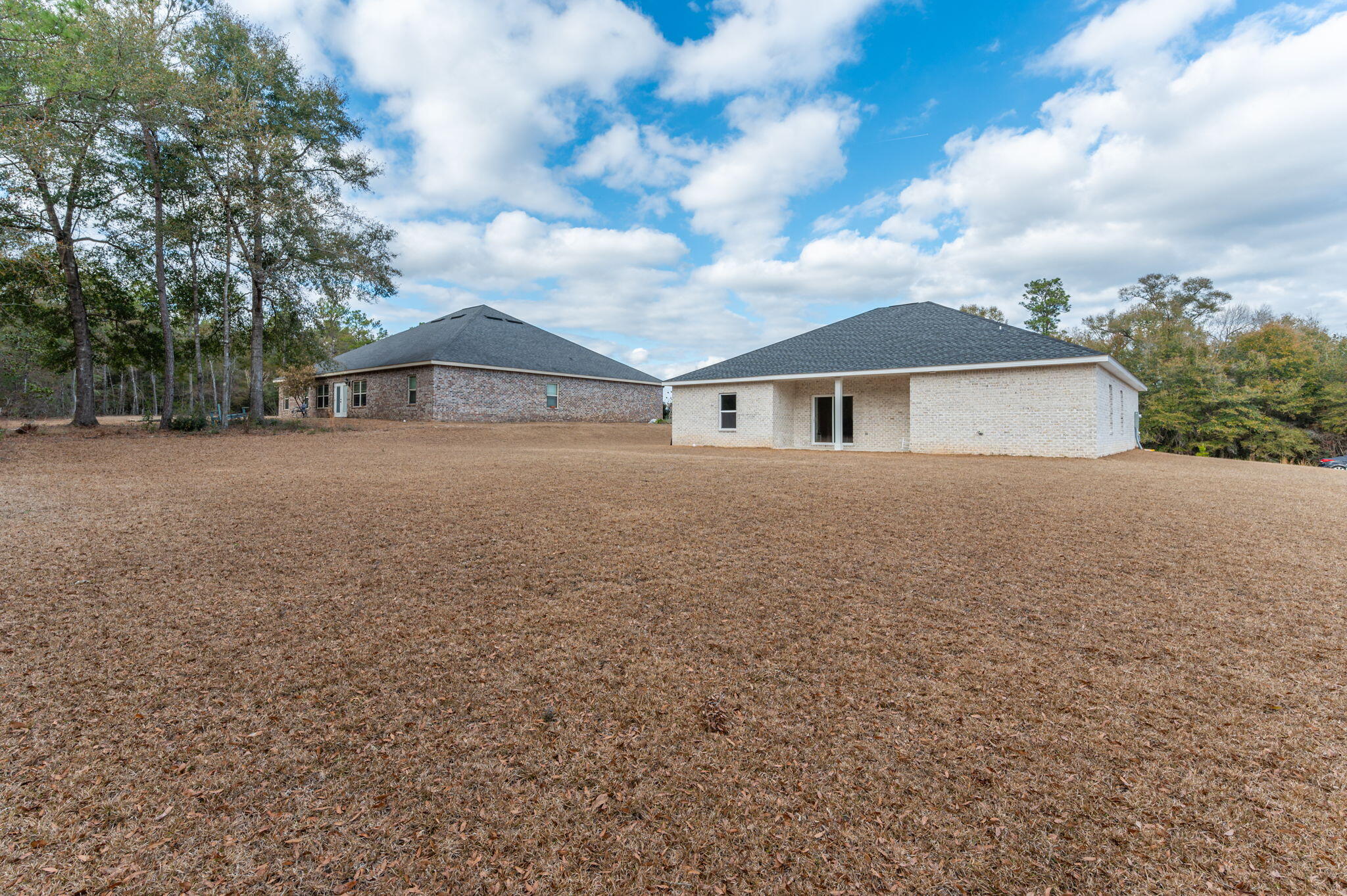 5754 Wayne Rogers Road Crestview, FL 32539 - Photo 29 of 44 a view of house with yard and entertaining space
