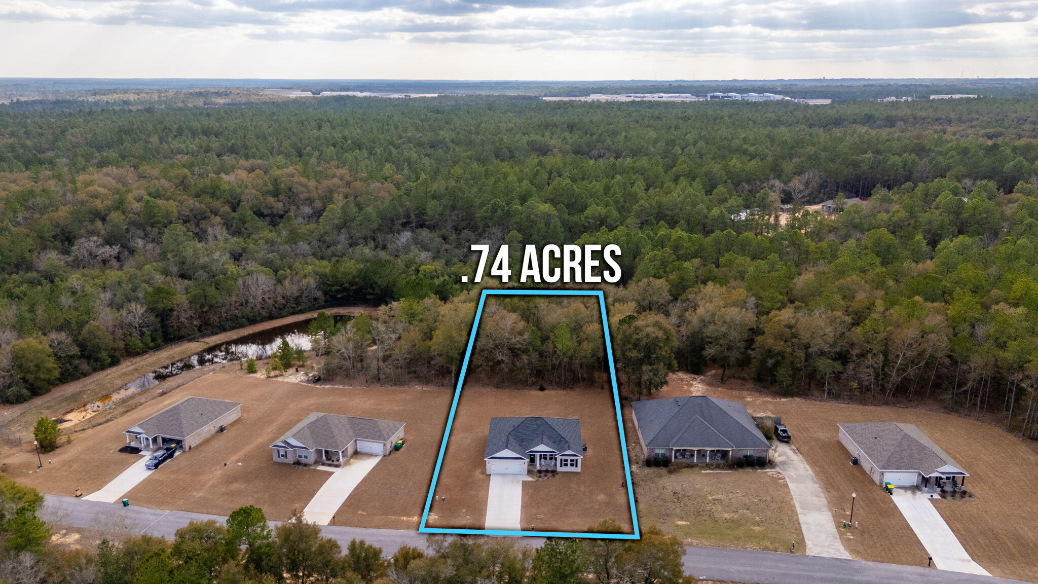 5754 Wayne Rogers Road Crestview, FL 32539 - Photo 32 of 44 a view of a back yard