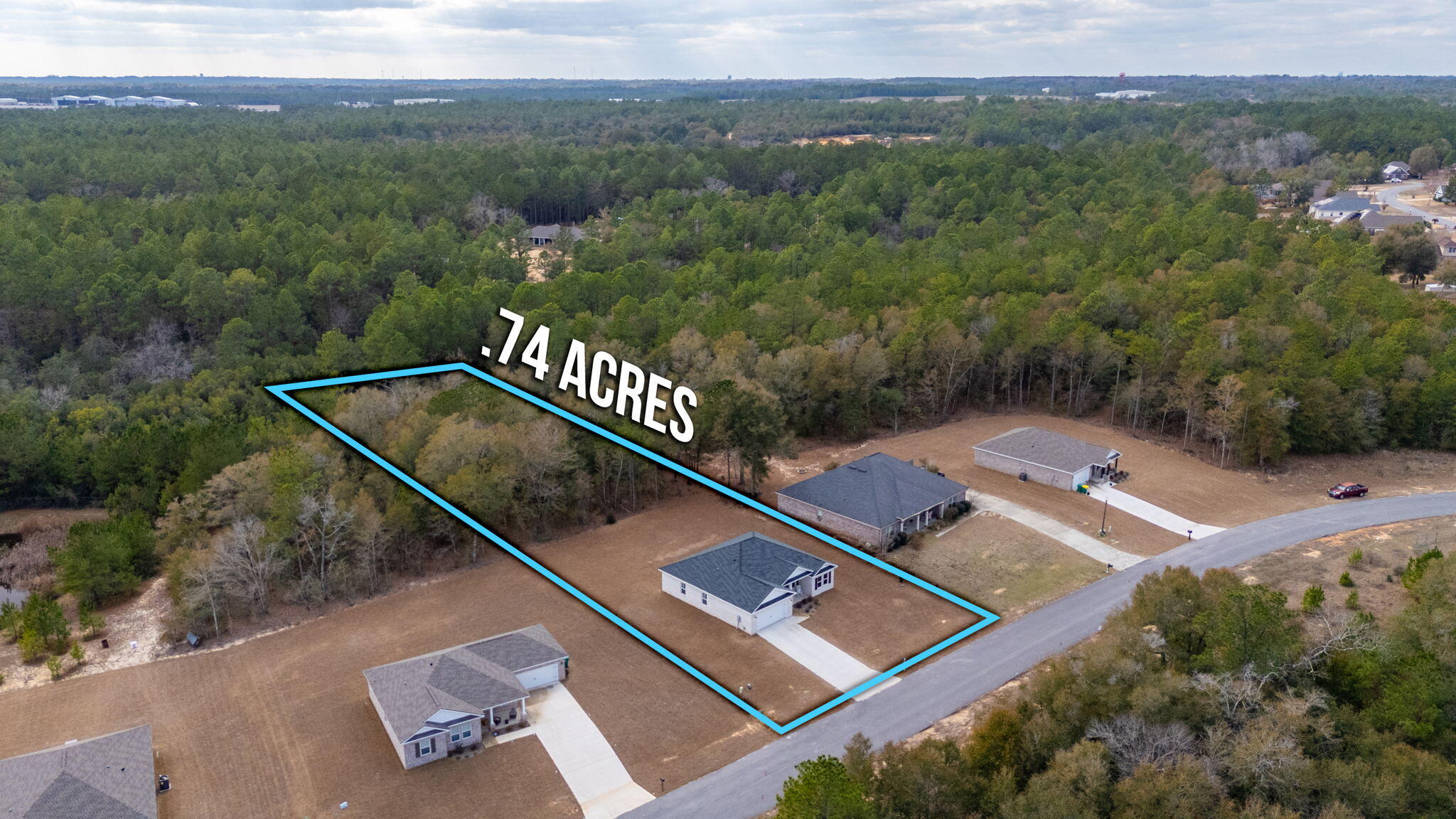 5754 Wayne Rogers Road Crestview, FL 32539 - Photo 34 of 44 an aerial view of a house with a yard