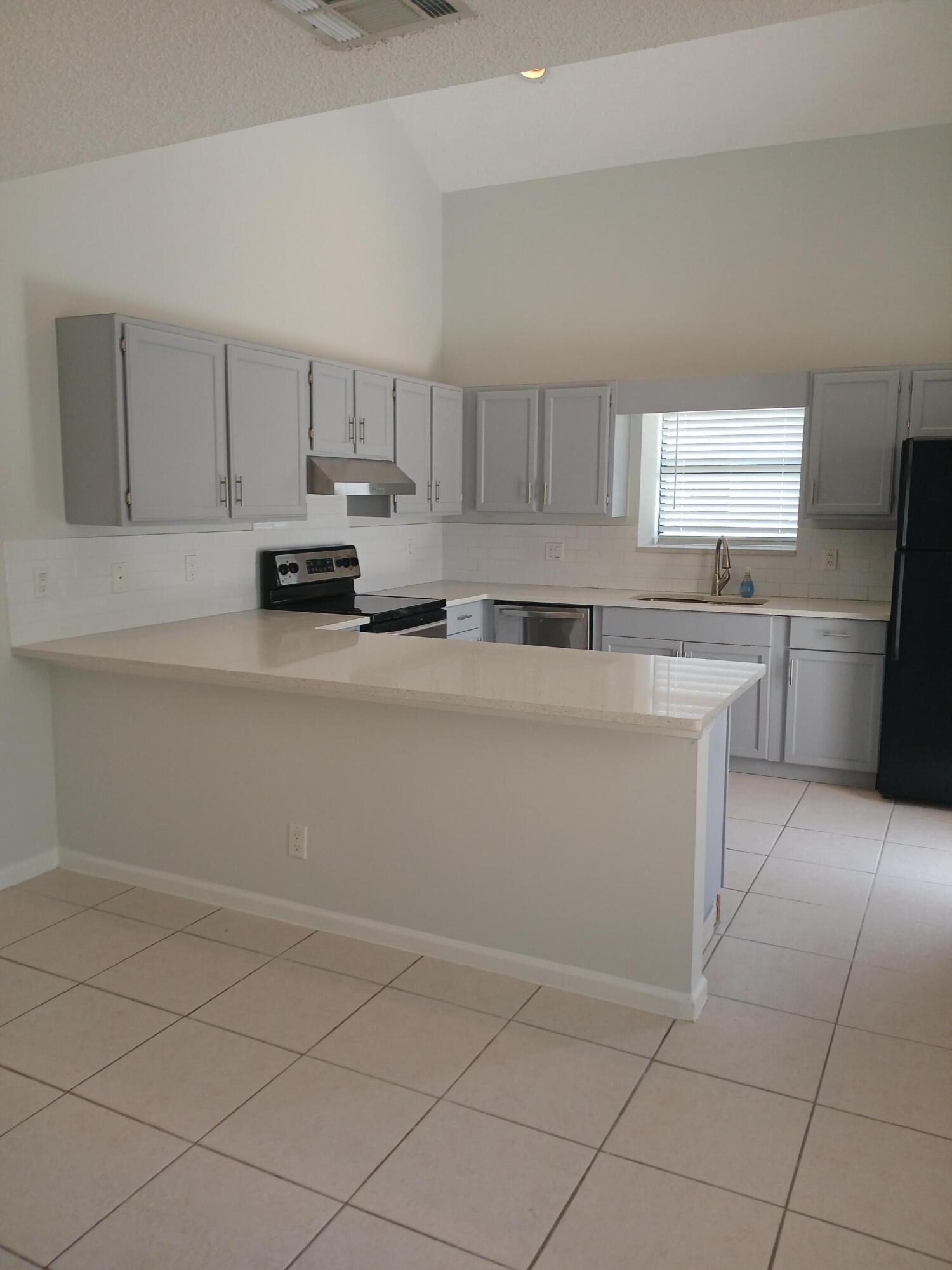 1103 Summerwinds Lane Jupiter, FL 33458 - Photo 3 of 19 1103-12