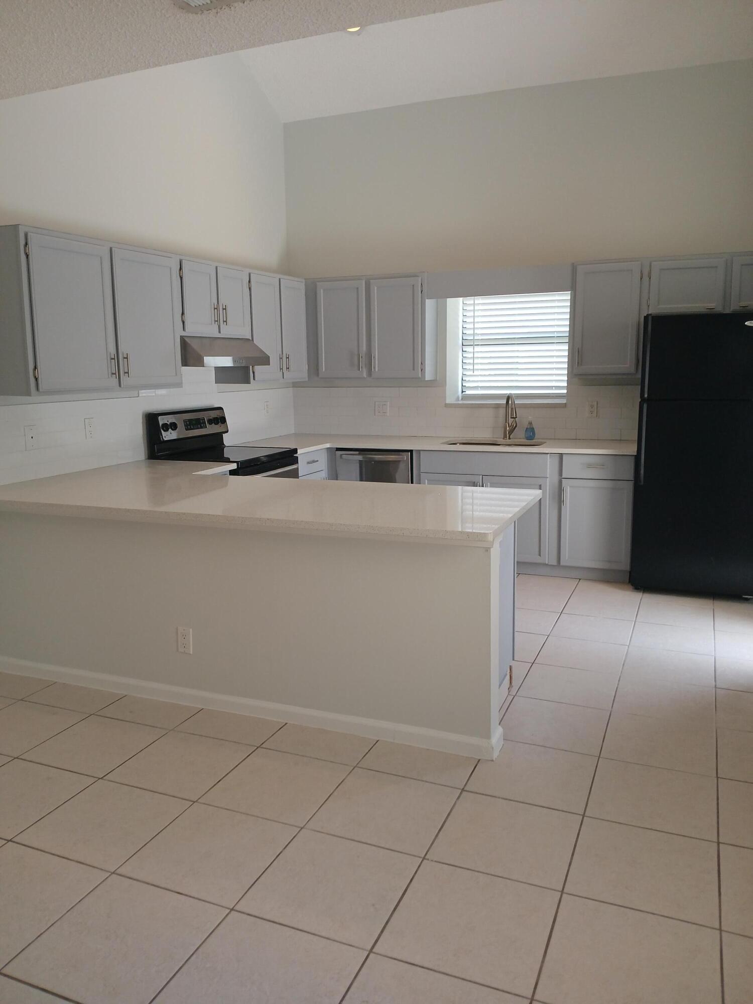 1103 Summerwinds Lane Jupiter, FL 33458 - Photo 6 of 19 1103-13