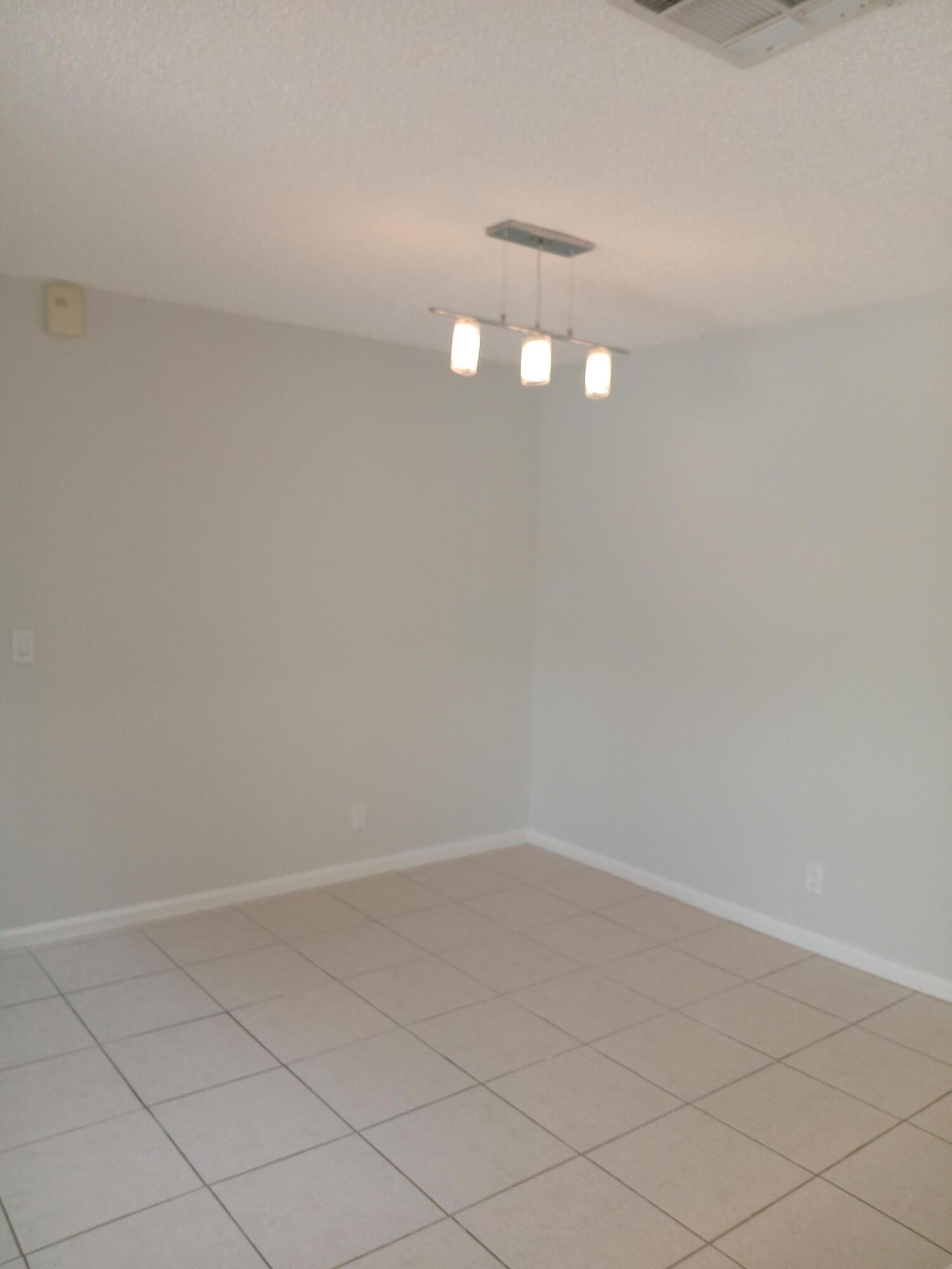 1103 Summerwinds Lane Jupiter, FL 33458 - Photo 7 of 19 1103-11