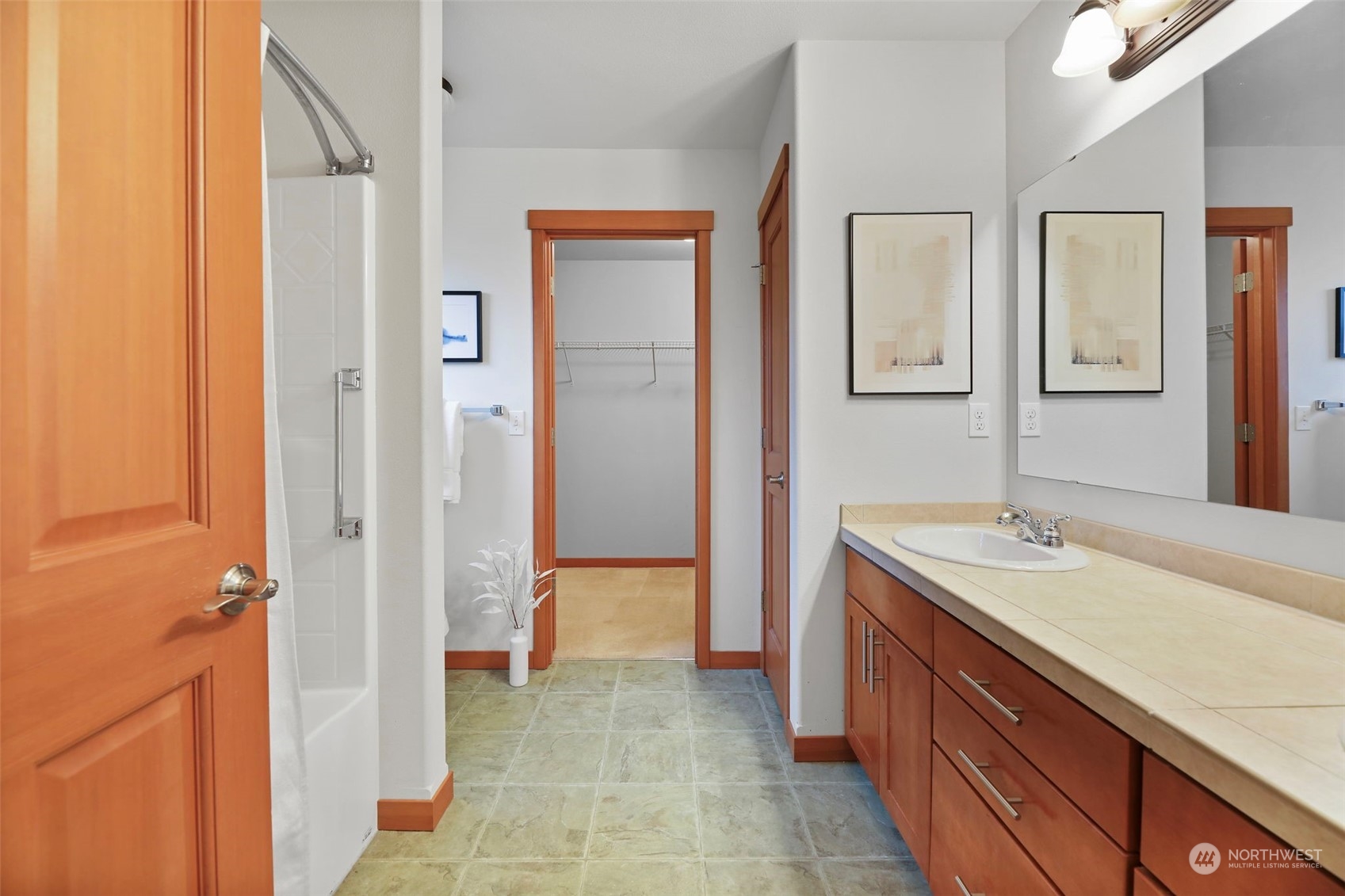 910 209th Street Southeast Bothell, WA 98021 - Photo 17 of 28 a spacious bathroom with a sink and a mirror