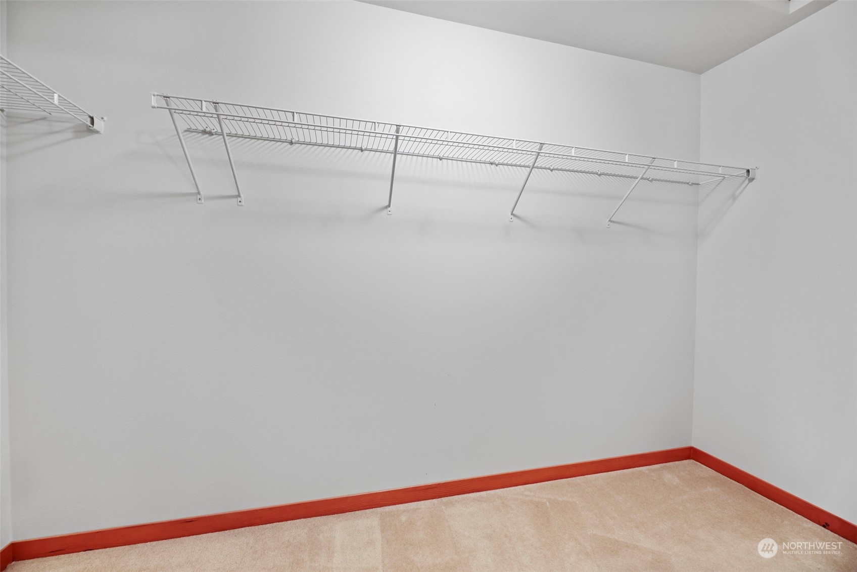 910 209th Street Southeast Bothell, WA 98021 - Photo 19 of 28 a view of a room with racks on the wall