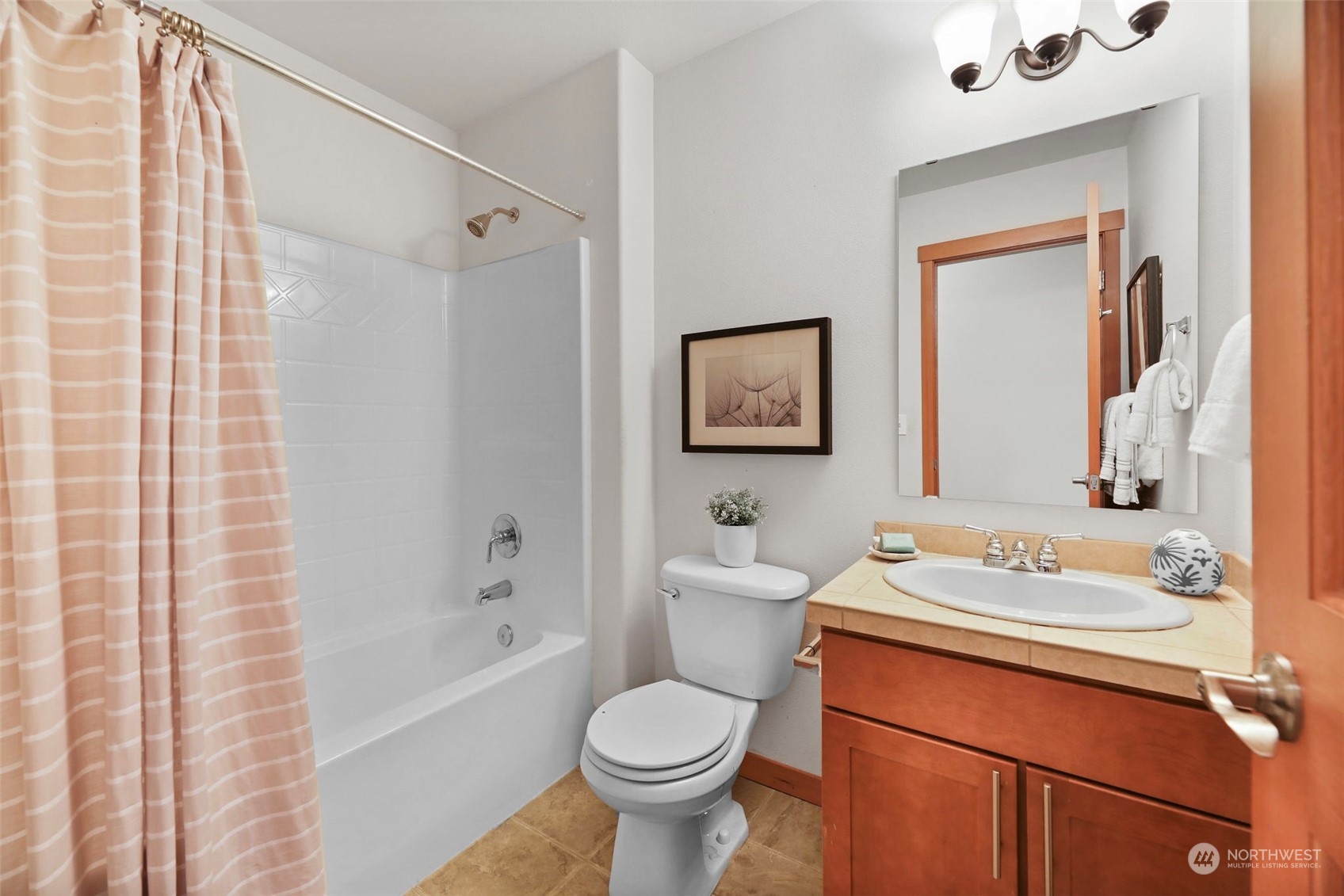 910 209th Street Southeast Bothell, WA 98021 - Photo 21 of 28 a bathroom with a sink toilet and shower