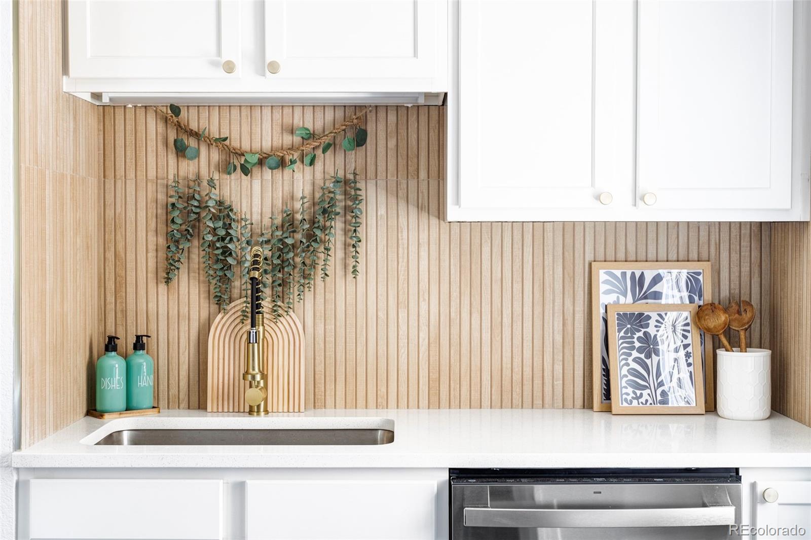 2313 South Race Street, Unit A Denver, CO 80210 - Photo 1 of 16 a view of wooden floor and a potted plant