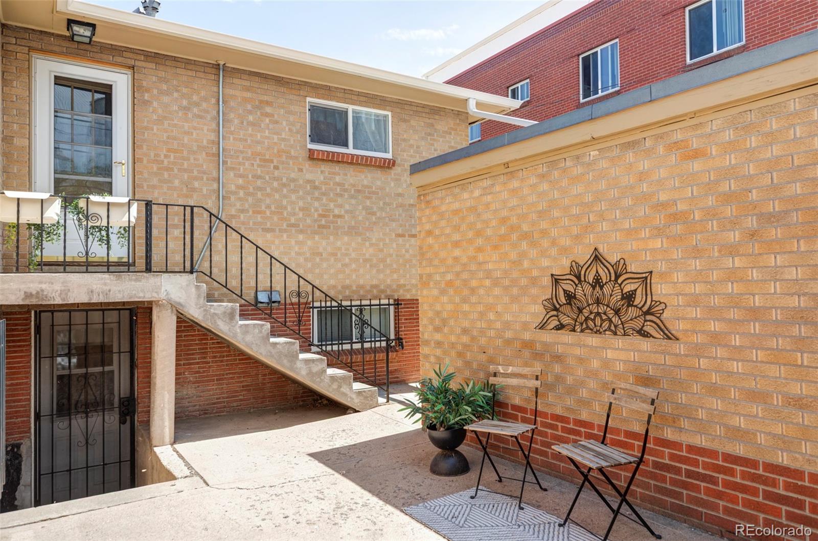 2313 South Race Street, Unit A Denver, CO 80210 - Photo 16 of 16 a view of a balcony with furniture