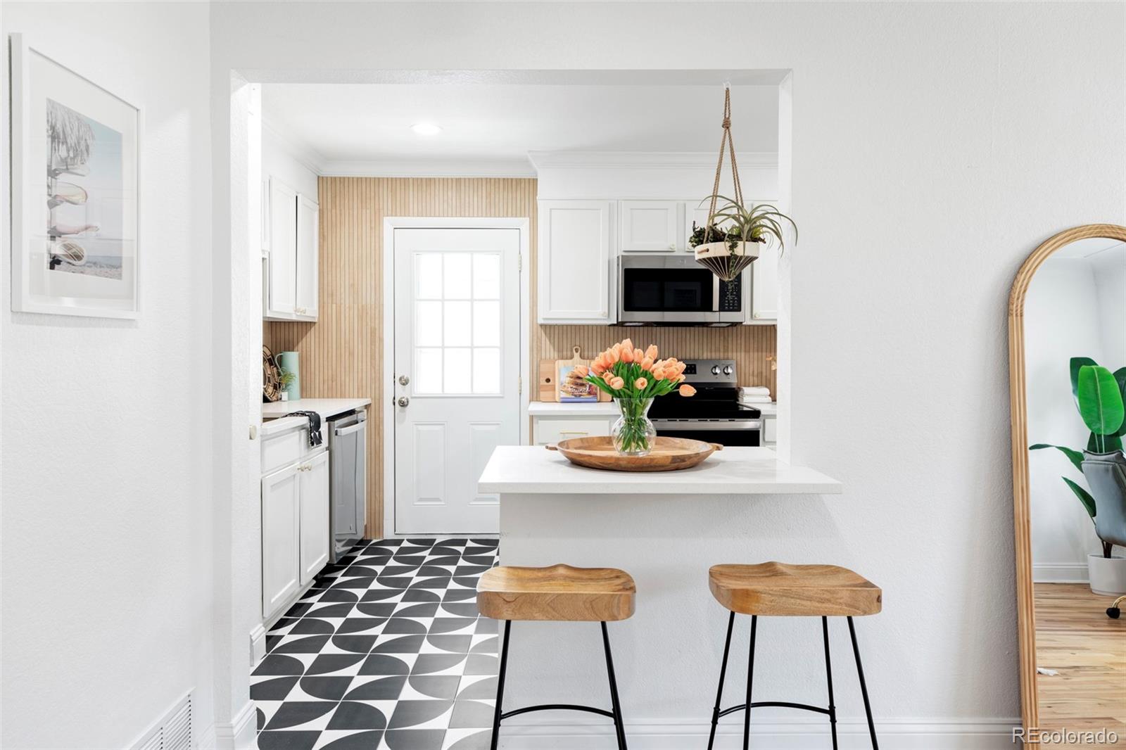 2313 South Race Street, Unit A Denver, CO 80210 - Photo 5 of 16 a dining room with furniture and window
