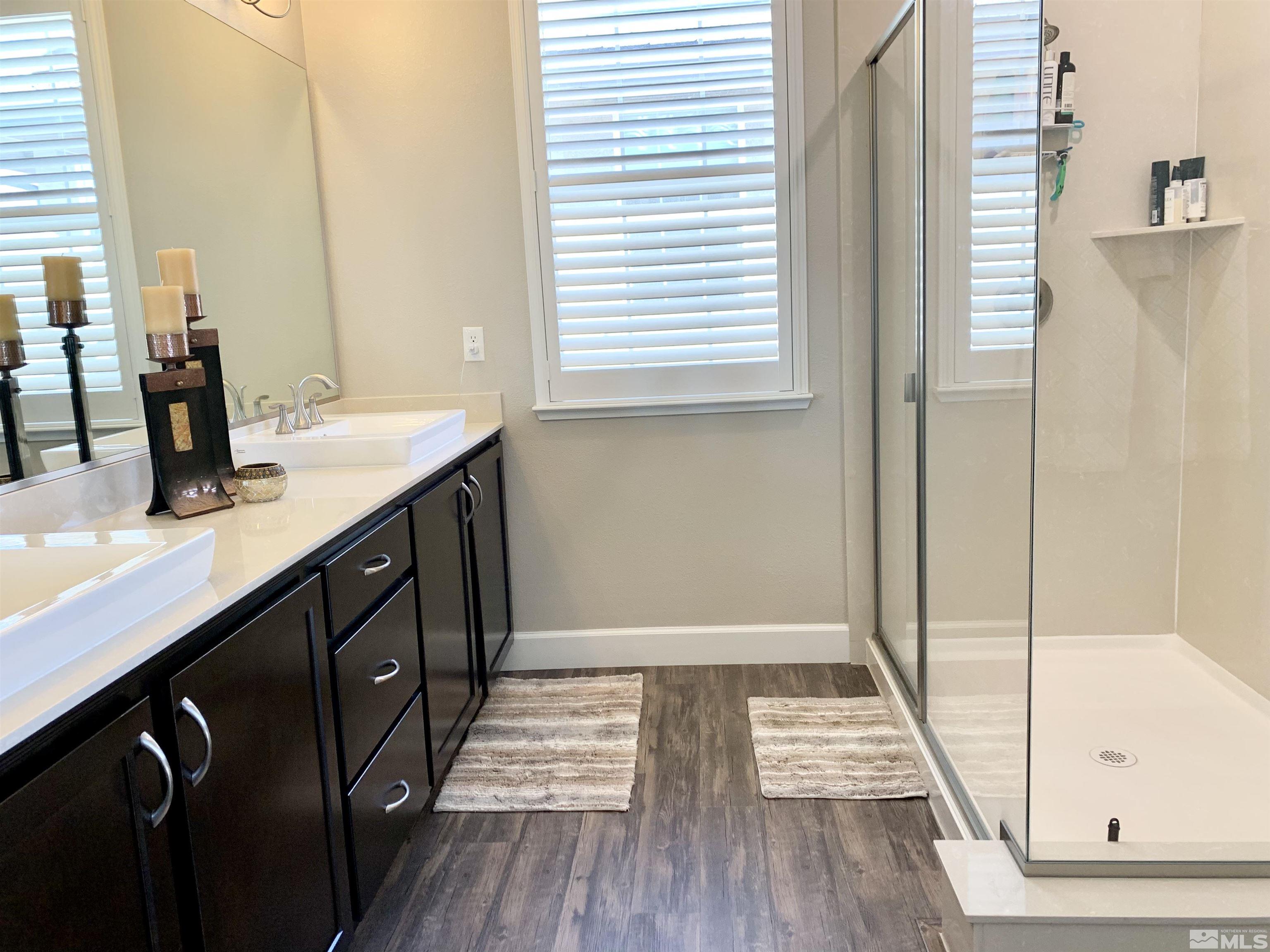 1970 Dark Horse Road, Unit C Reno, NV 89521 - Photo 20 of 35 a bathroom with a sink and a mirror