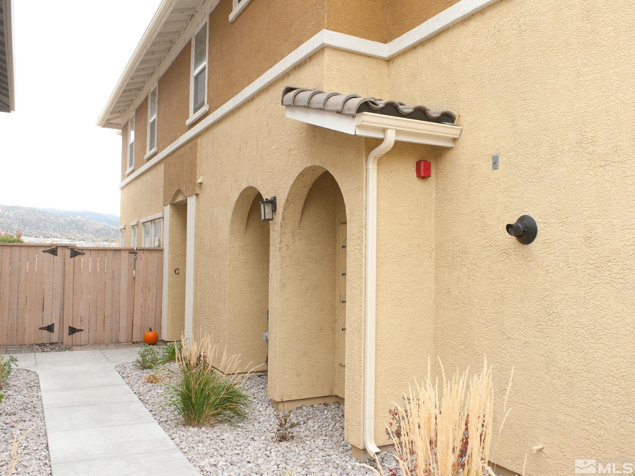 1970 Dark Horse Road, Unit C Reno, NV 89521 - Photo 2 of 35 a view of a door with a glass door
