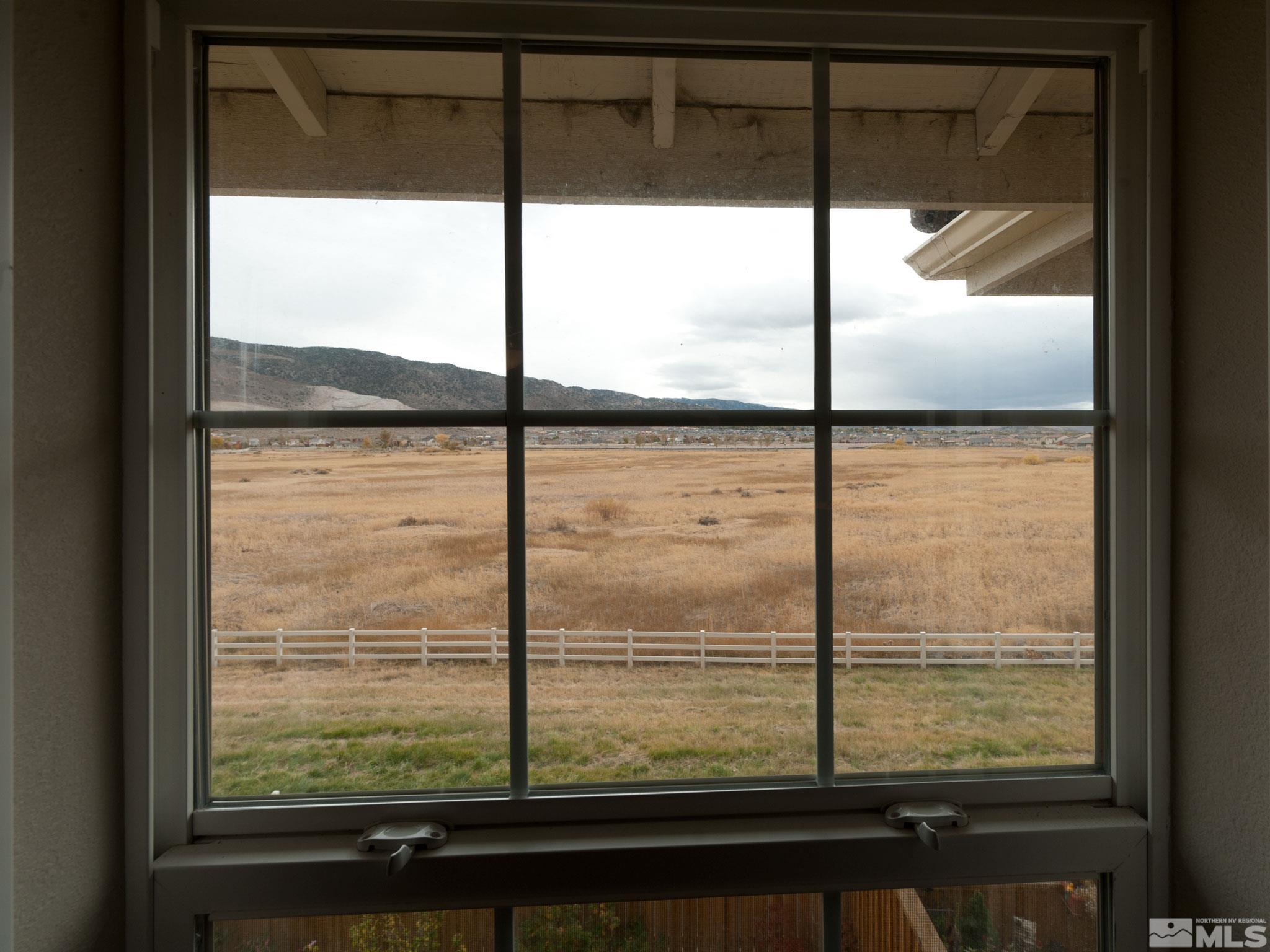 1970 Dark Horse Road, Unit C Reno, NV 89521 - Photo 21 of 35 a view of a glass door with a large window