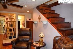1495 Cobbs Creek Road Boone, NC 28607 - Photo 11 of 22 a living room with furniture and flowers