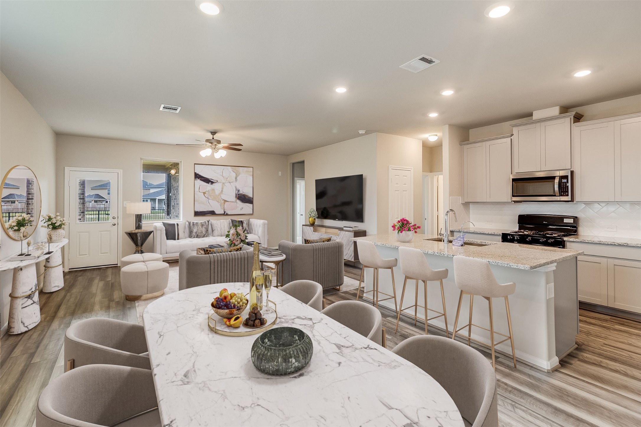 308 Redbud Rdg Drive Brookshire, TX 77423 - Photo 3 of 12 a living room with furniture a flat screen tv and a view of kitchen