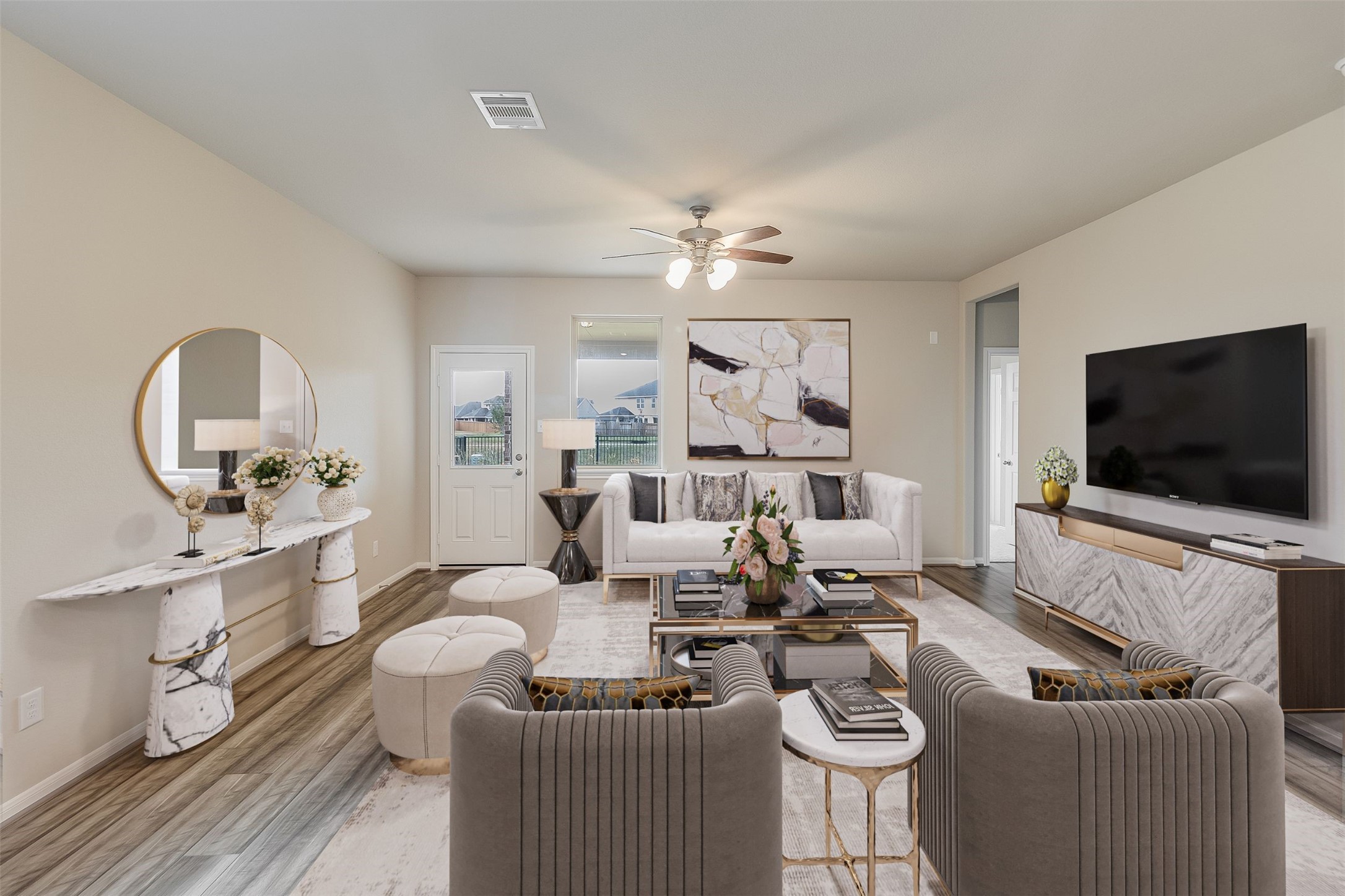 308 Redbud Rdg Drive Brookshire, TX 77423 - Photo 5 of 12 a living room with furniture a flat screen tv and kitchen view